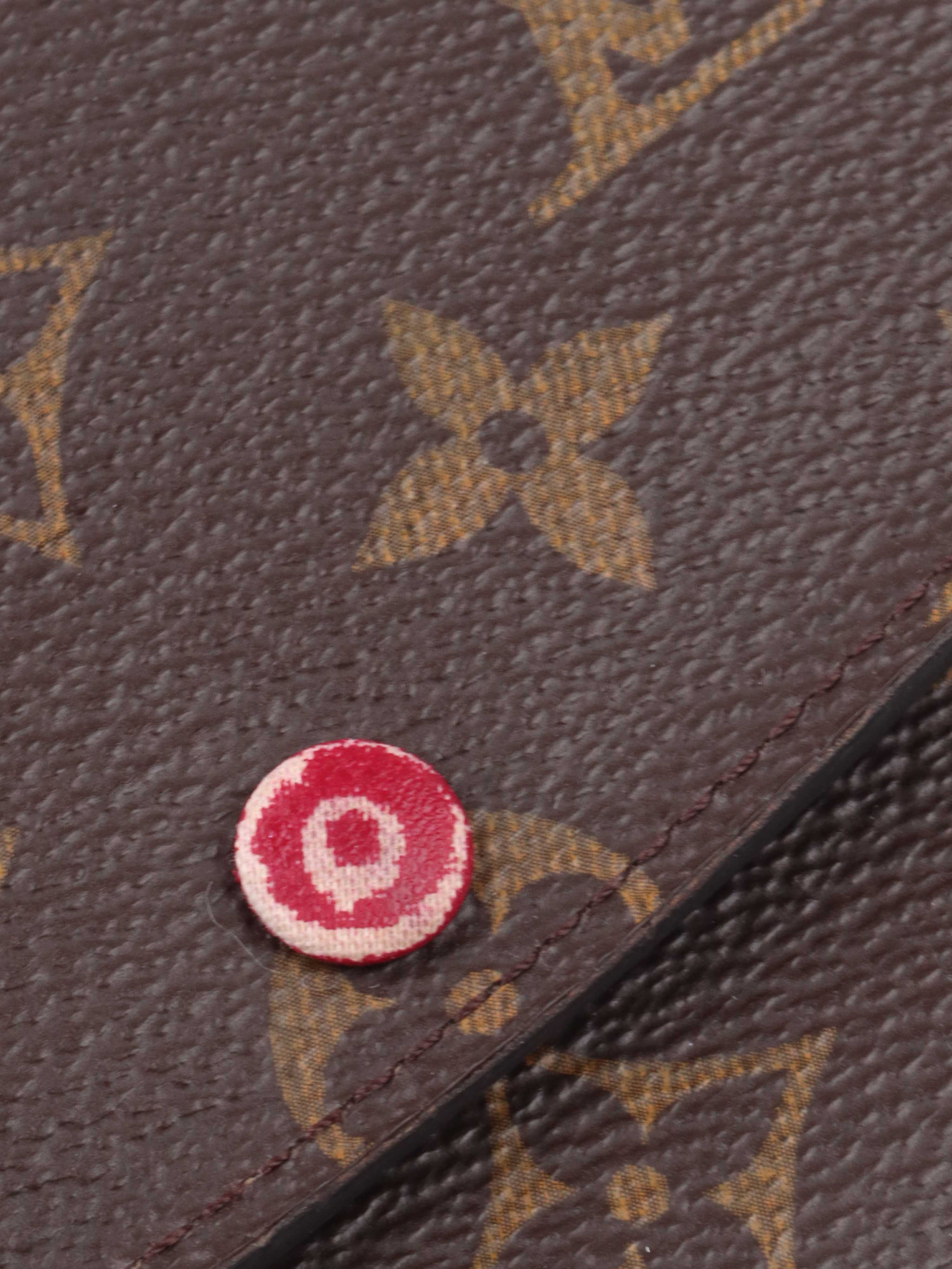 Louis Vuitton Monogram Sarah Wallet.