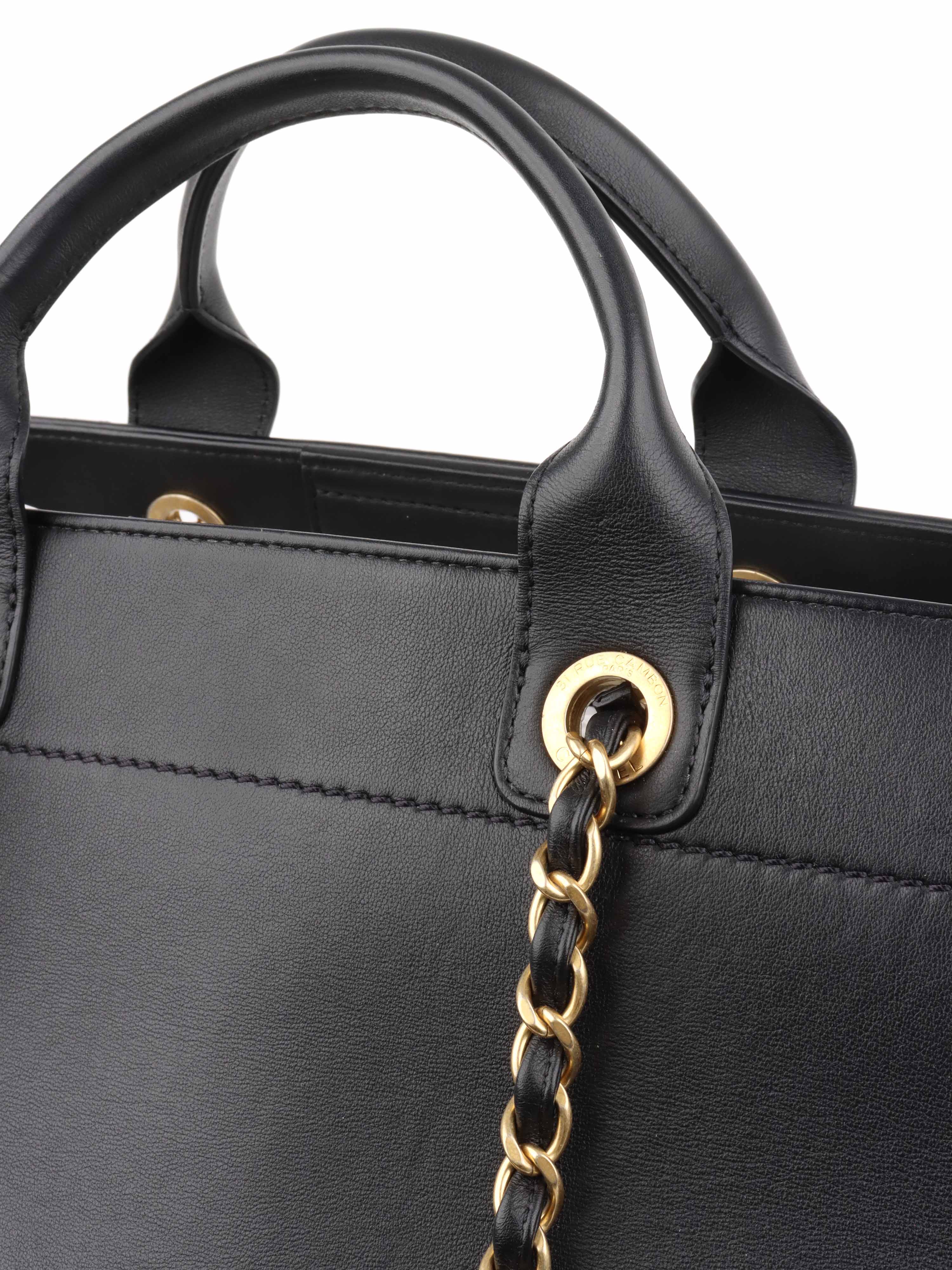 Chanel Black 
Raffia Deauville Tote.