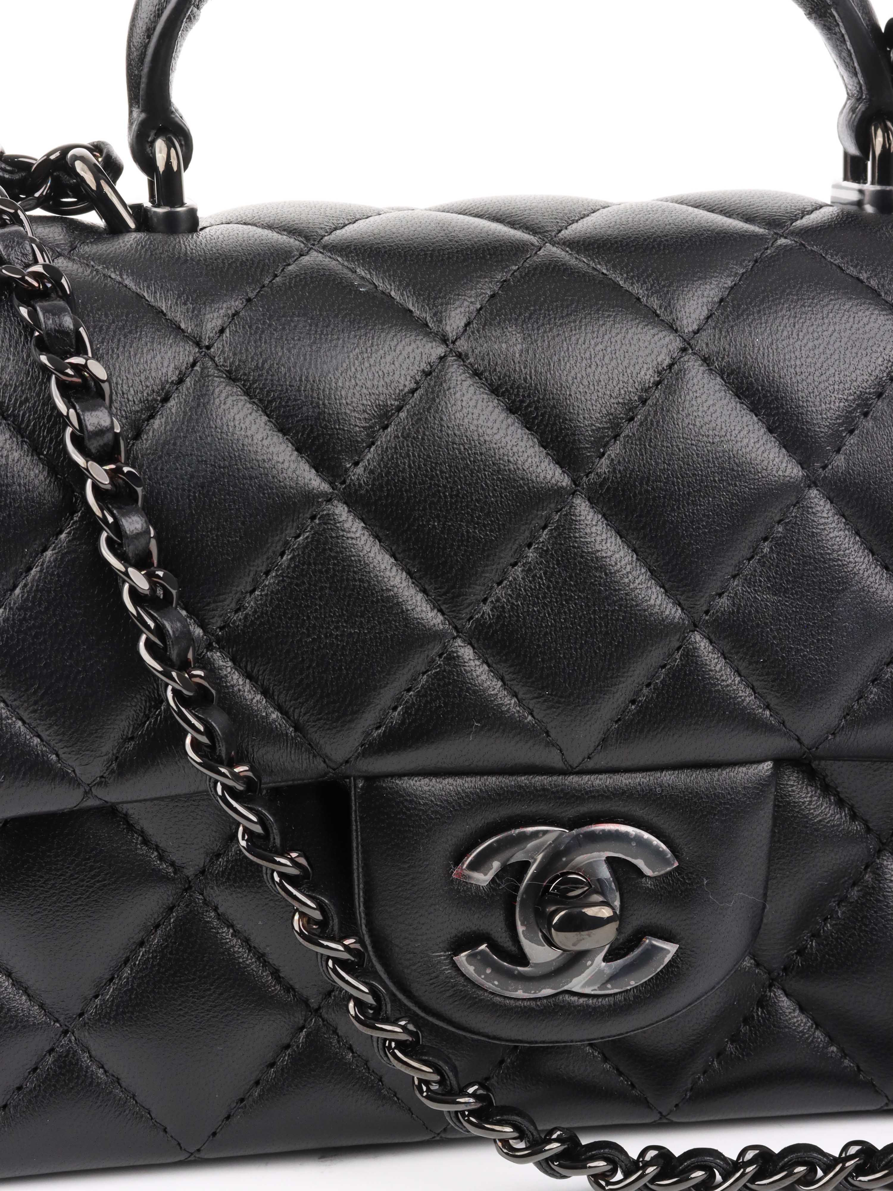 Chanel All Black Rectangular Classic Flap with Handle.