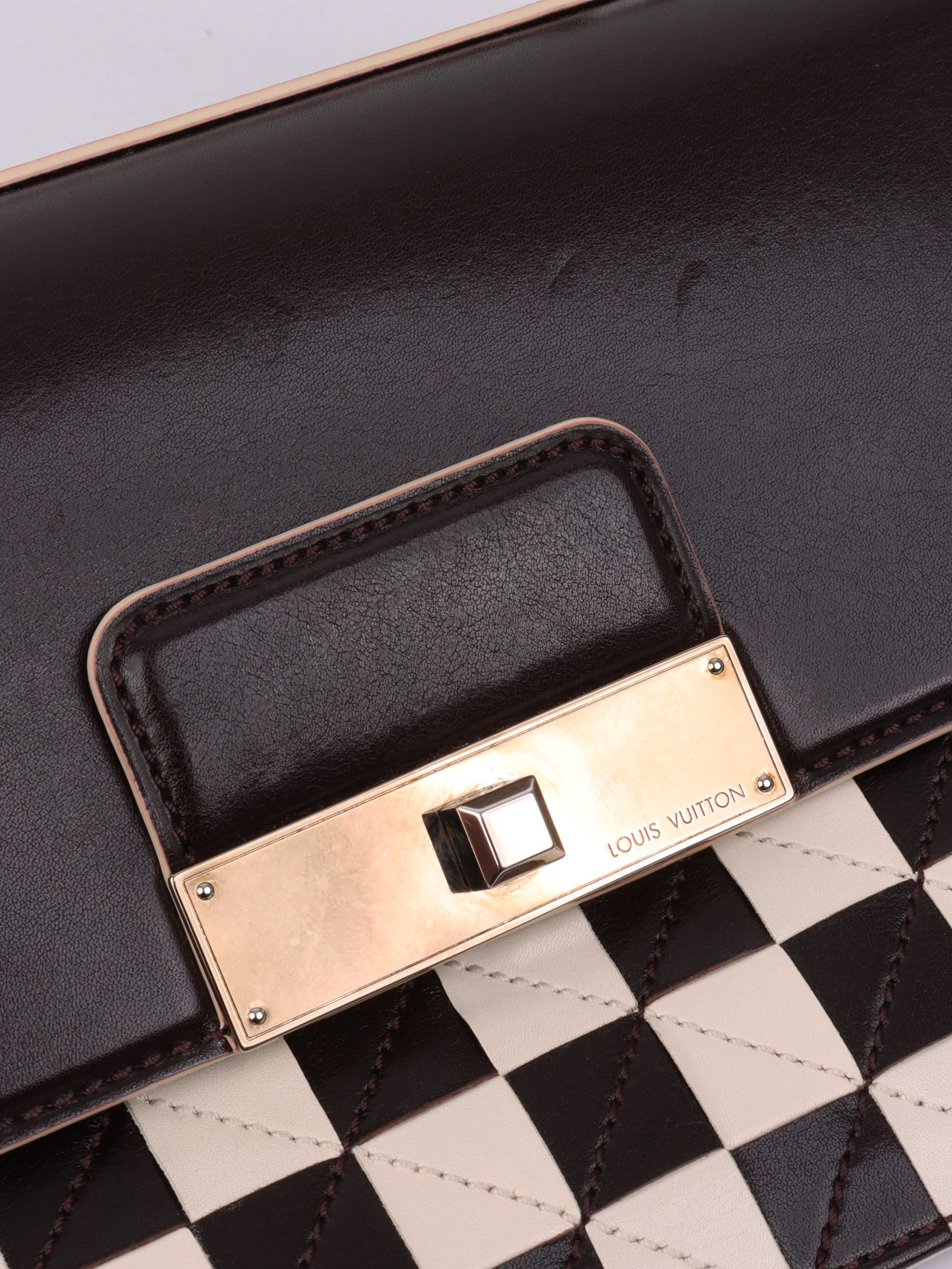 Louis Vuitton Black 
White Chess Board Clutch.