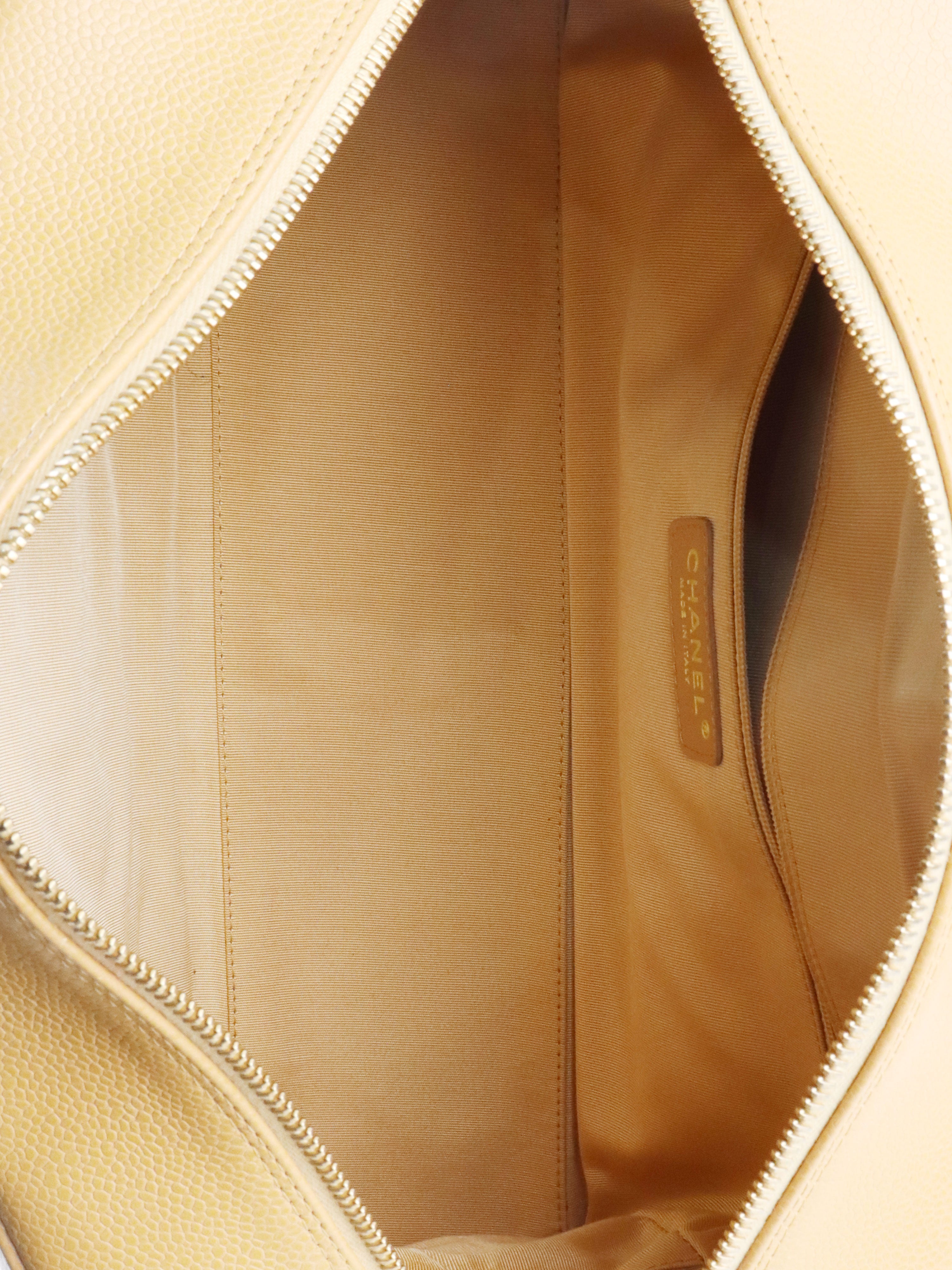 Chanel Beige Caviar Bowling Bag.