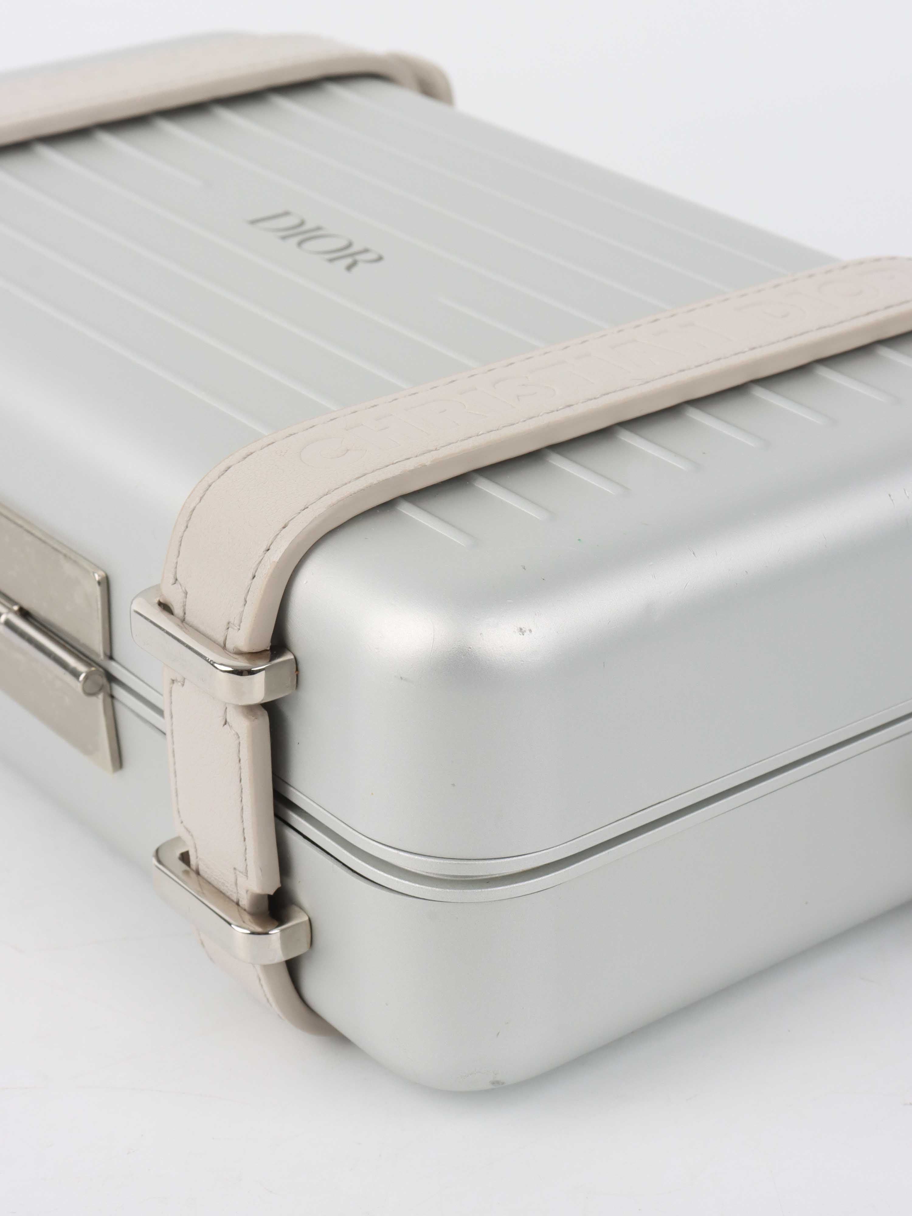 Dior x RIMOWA Silver Personal Clutch Case.