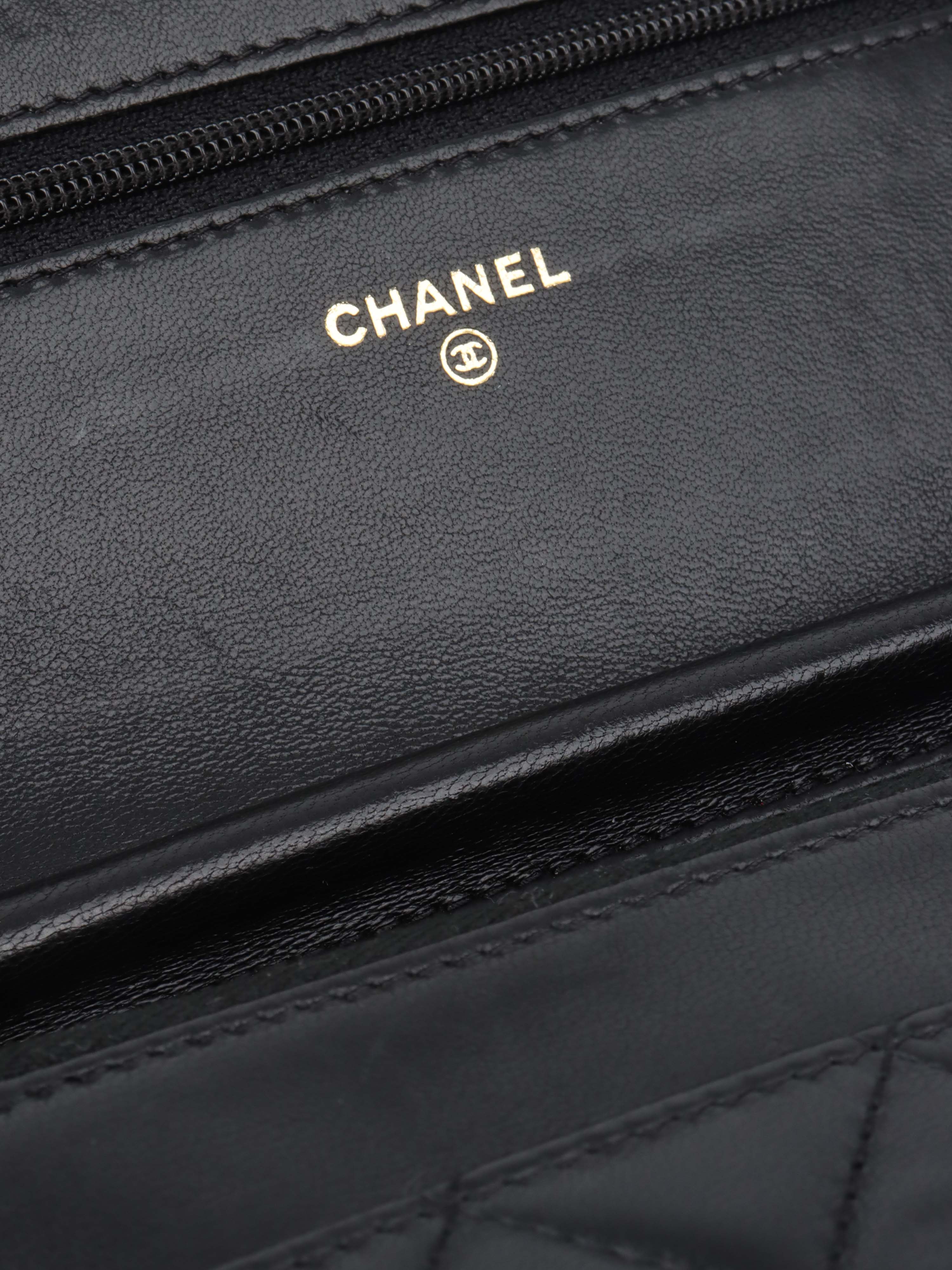 Chanel Black Buckled Lambskin Wallet on Chain.