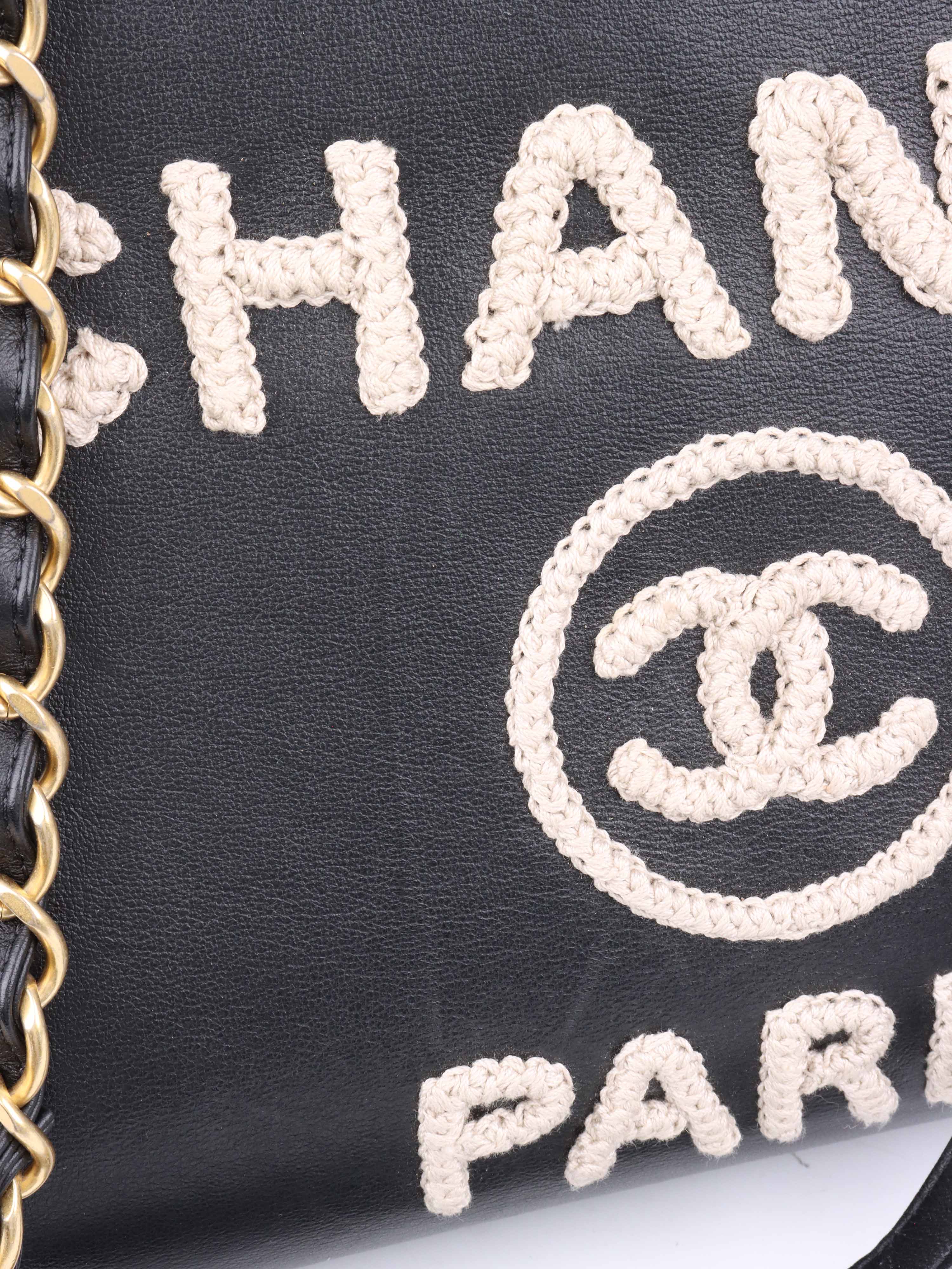 Chanel Black 
Raffia Deauville Tote.