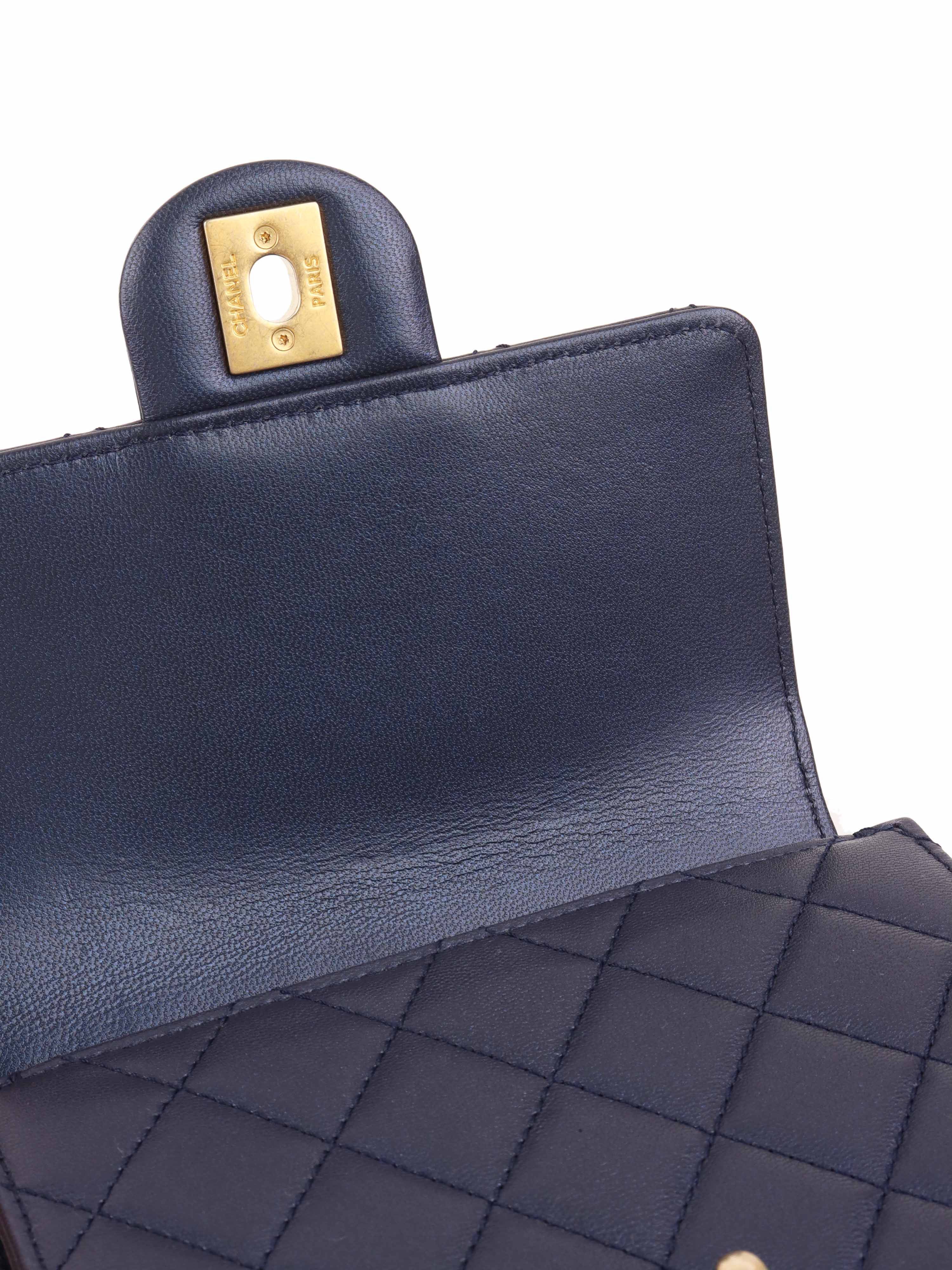 Chanel Navy Iridescent Flap Bag with Pearls.