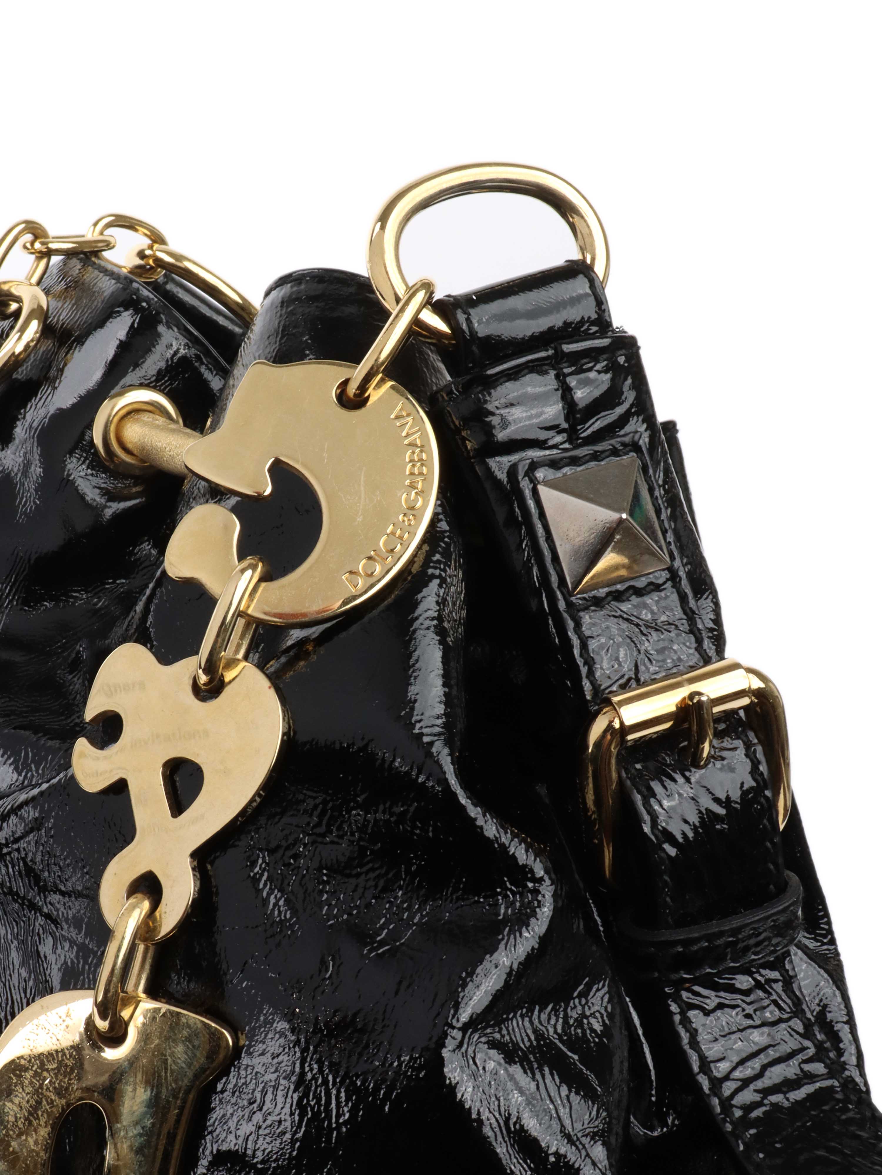 Dolce 
Gabbana Black 
Gold Patent Hobo Bag.