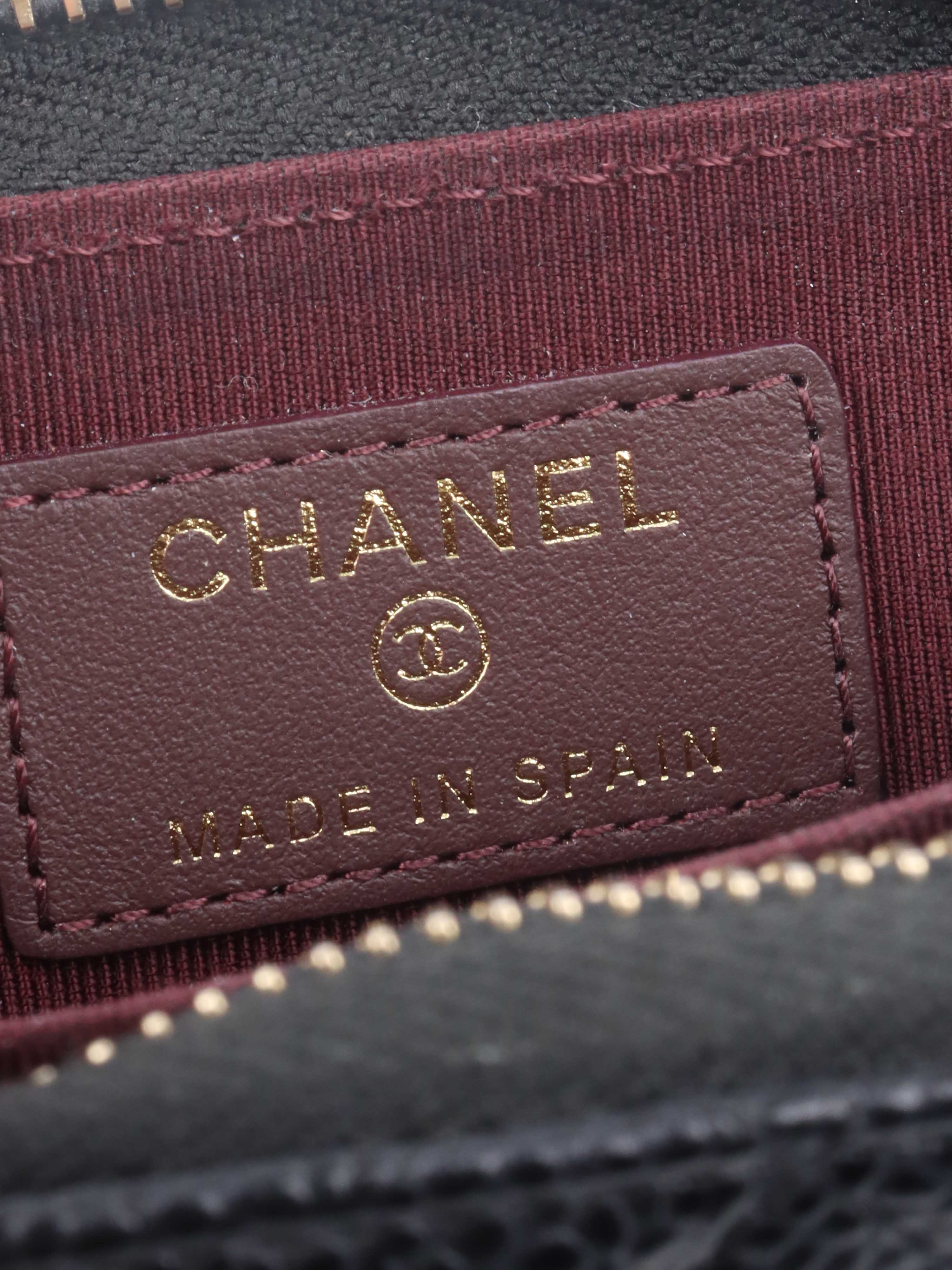 Chanel Black Caviar Zip Card Holder.