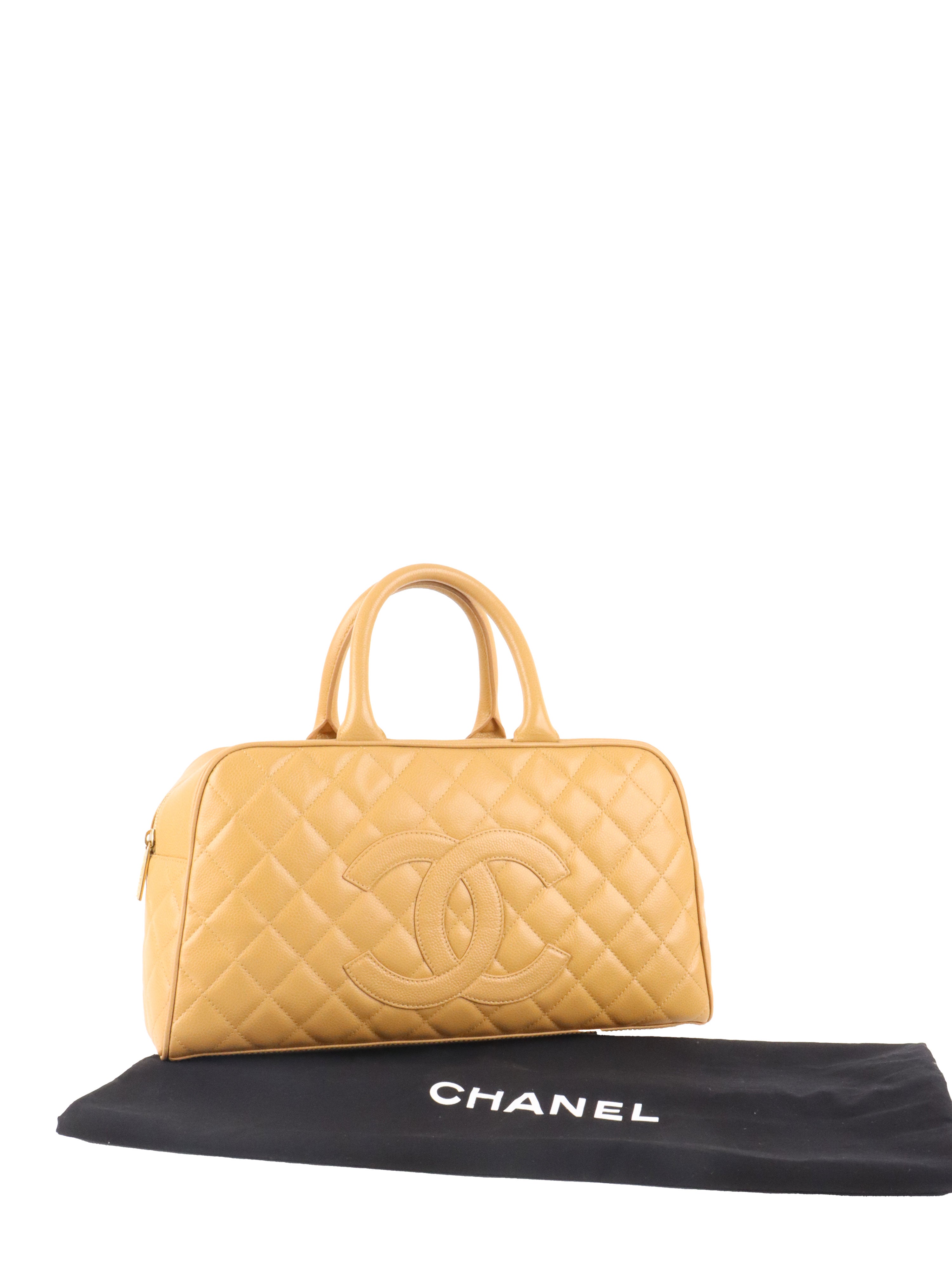 Chanel Beige Caviar Bowling Bag.
