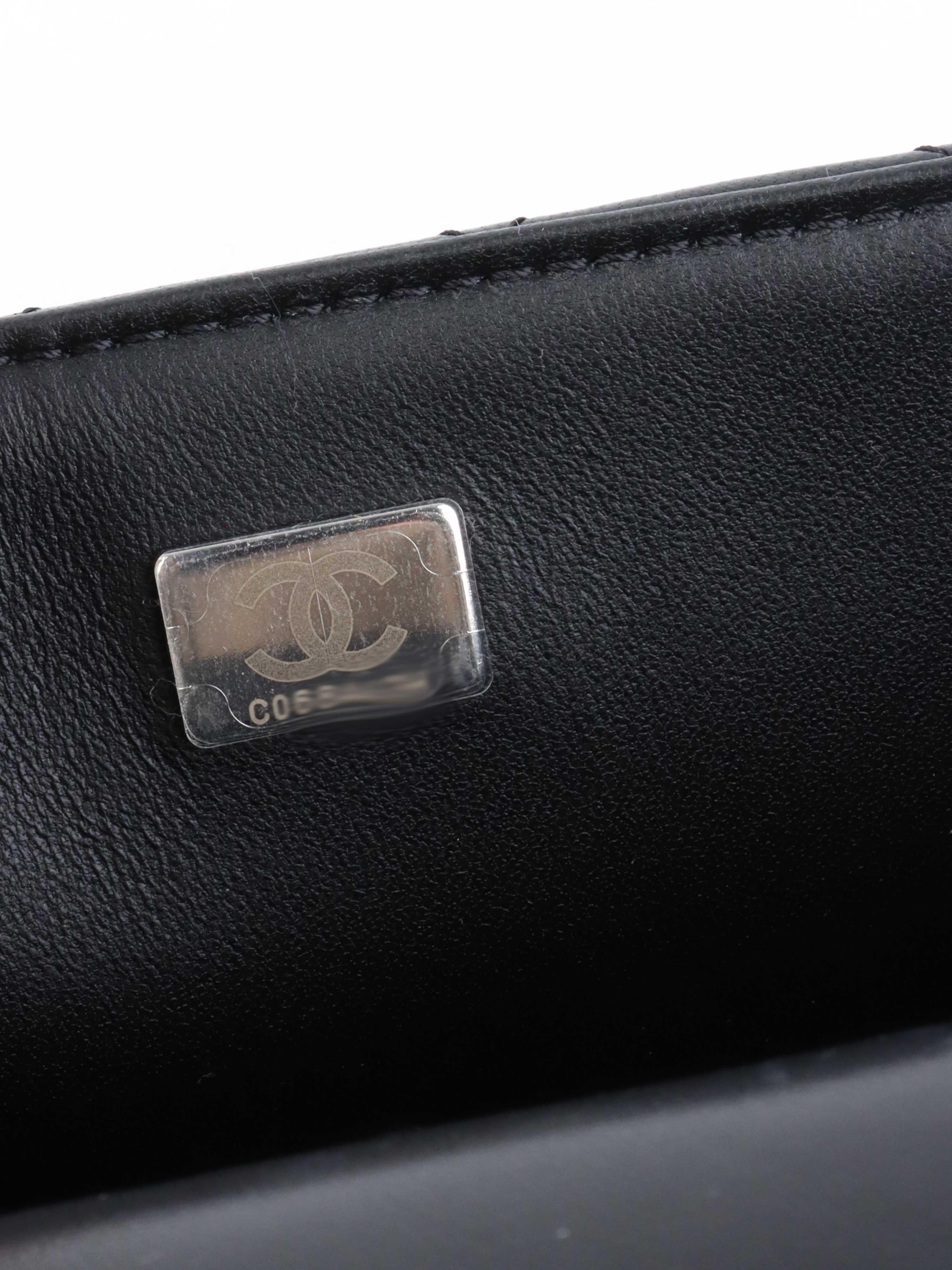 Chanel All Black Rectangular Classic Flap with Handle.