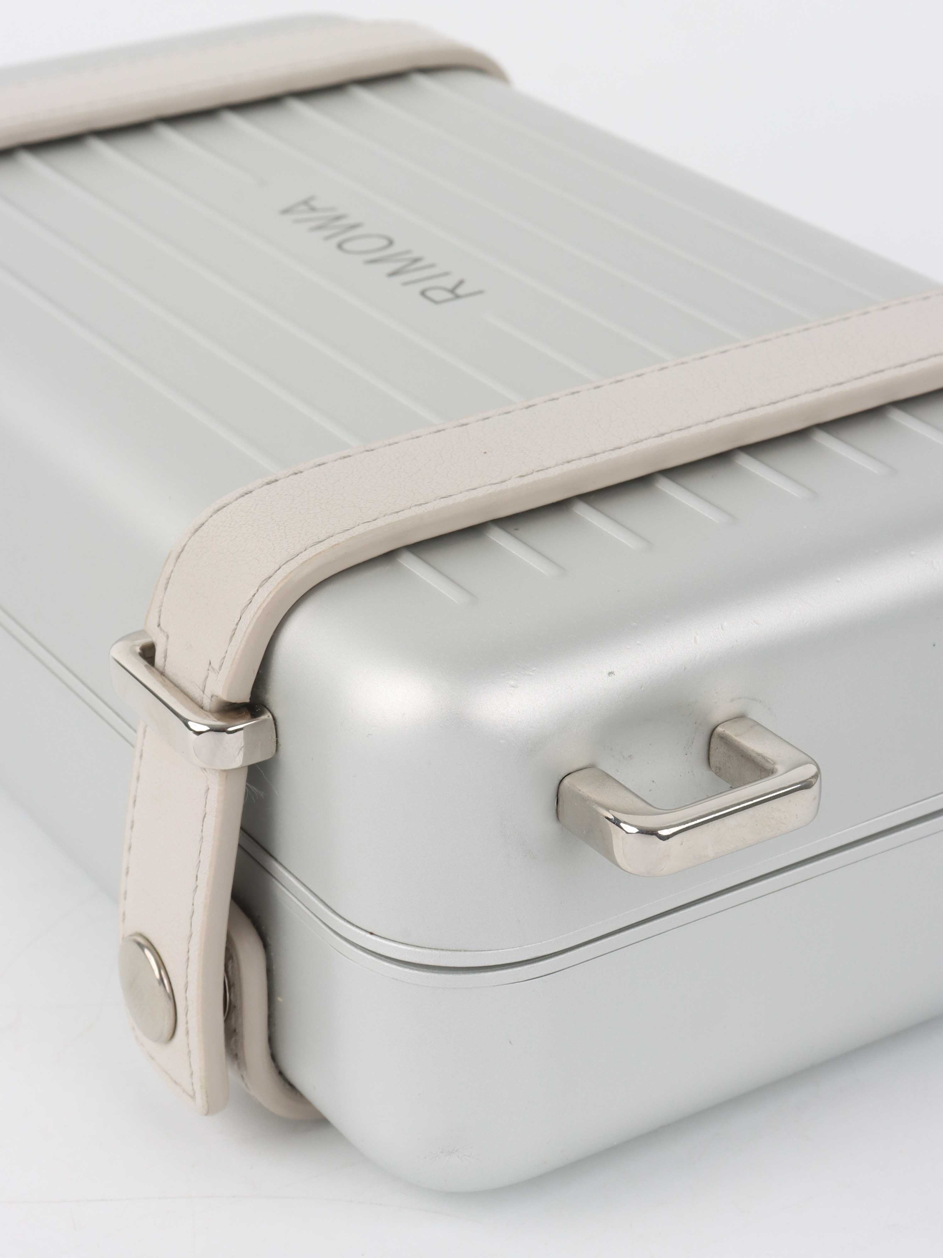 Dior x RIMOWA Silver Personal Clutch Case.