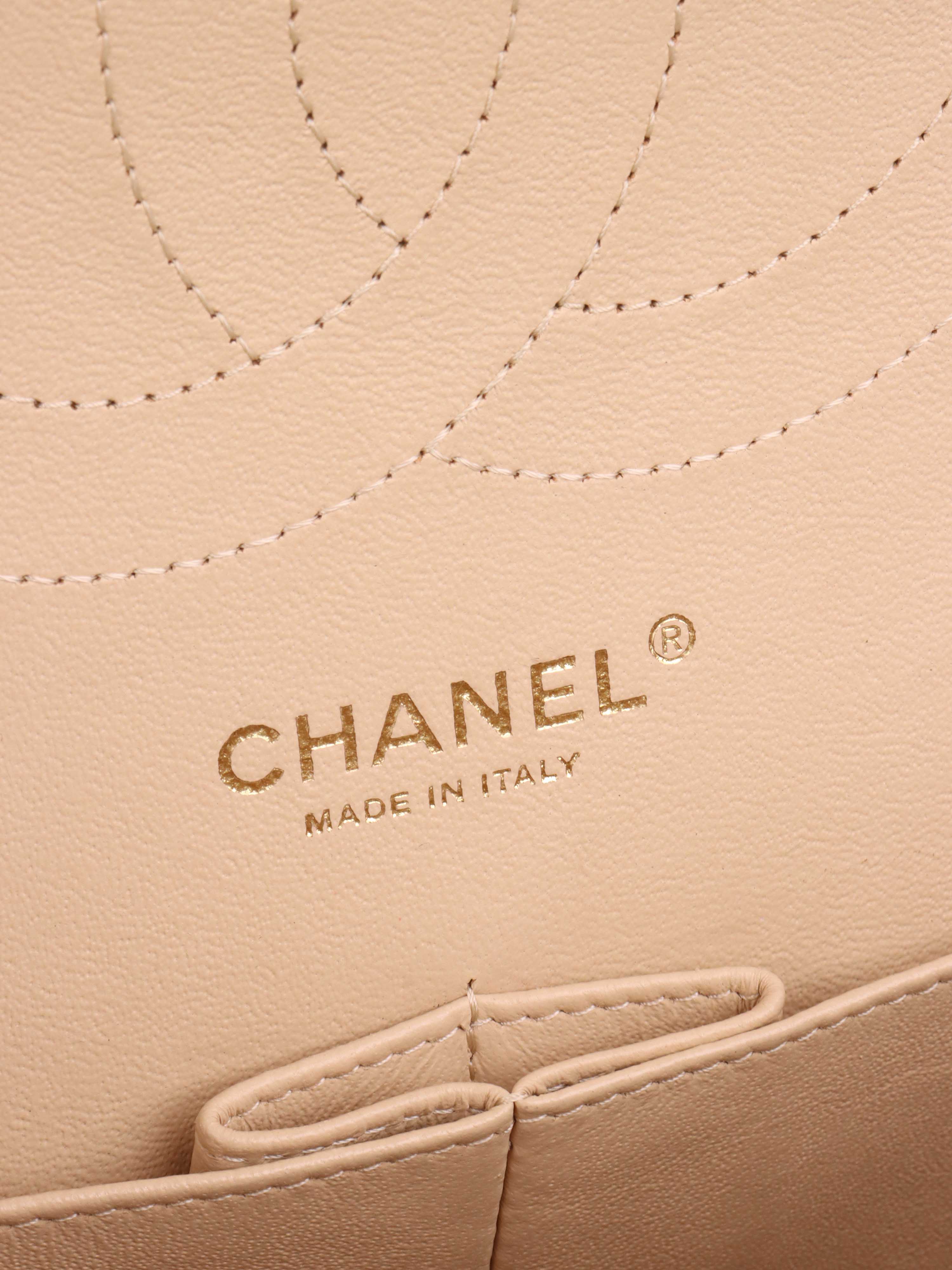 Chanel Beige Caviar Jumbo Classic Flap.