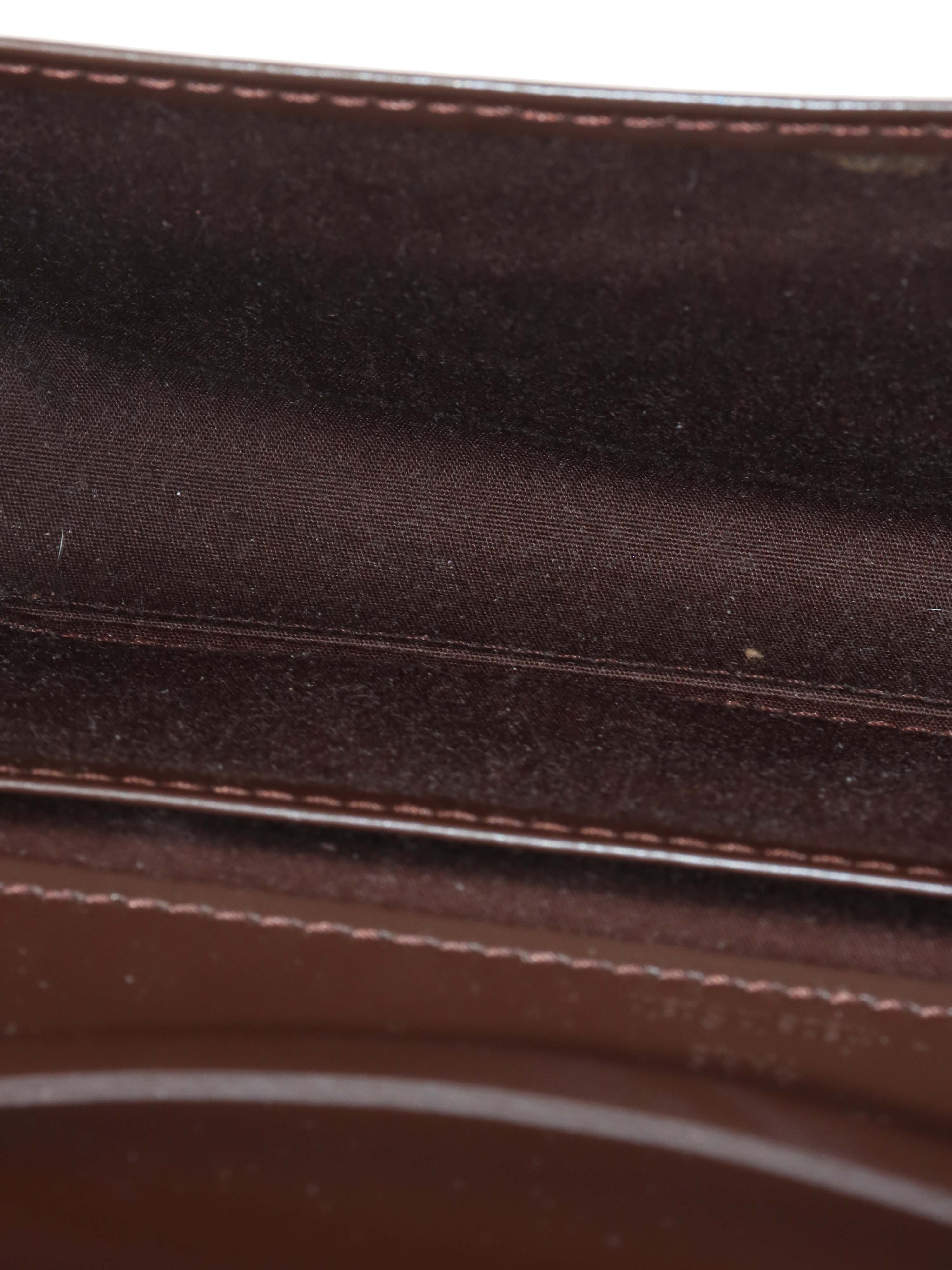 Louis Vuitton Brown Epi Leather Honfleur Clutch.