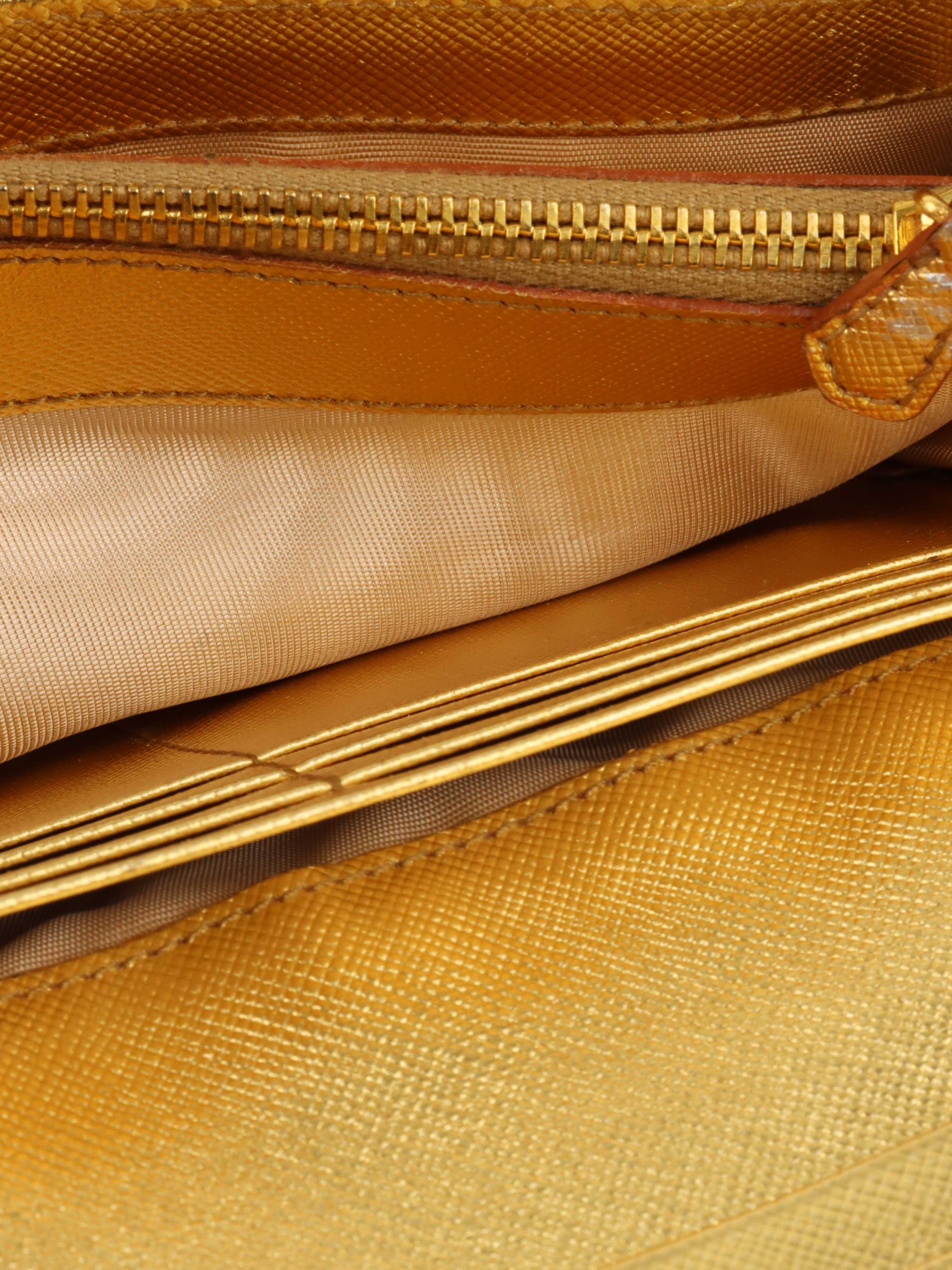 Prada Gold Saffiano Leather Wallet.