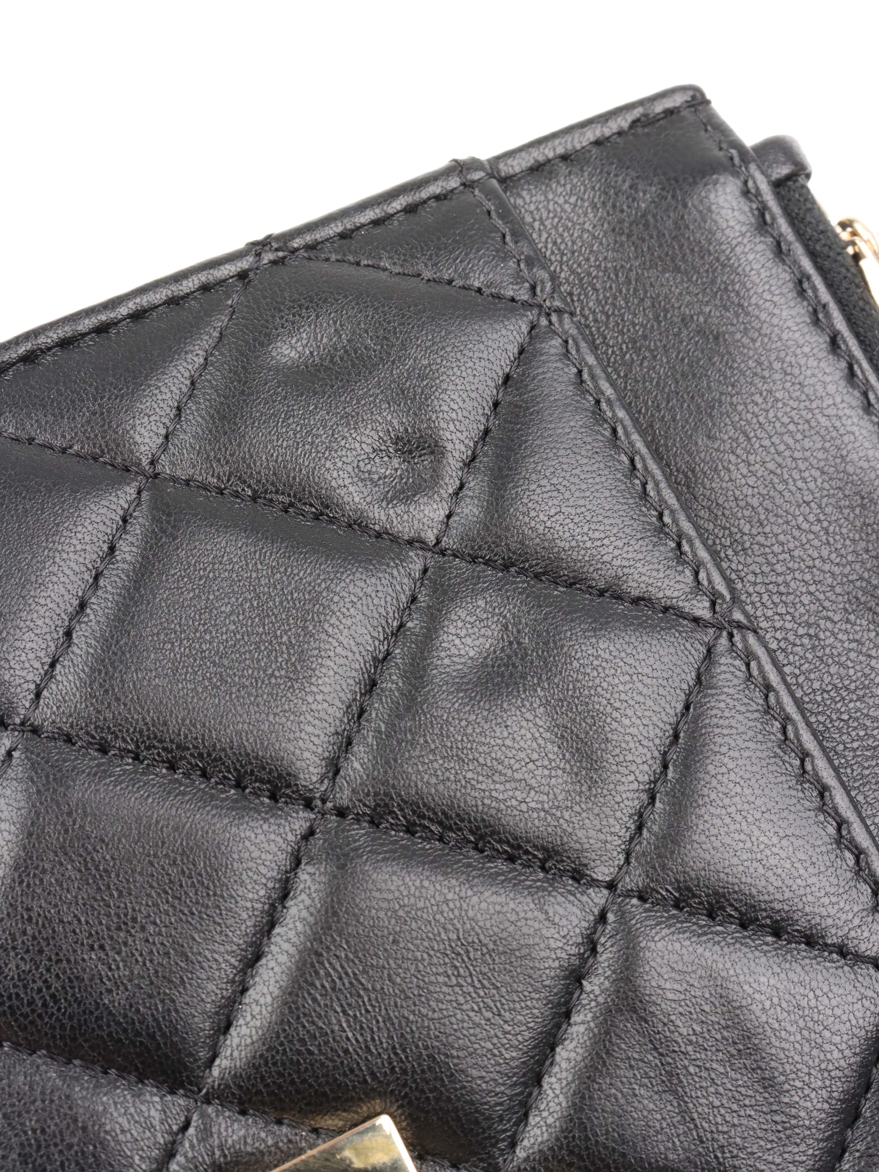 Chanel Black Buckled Lambskin Wallet on Chain.