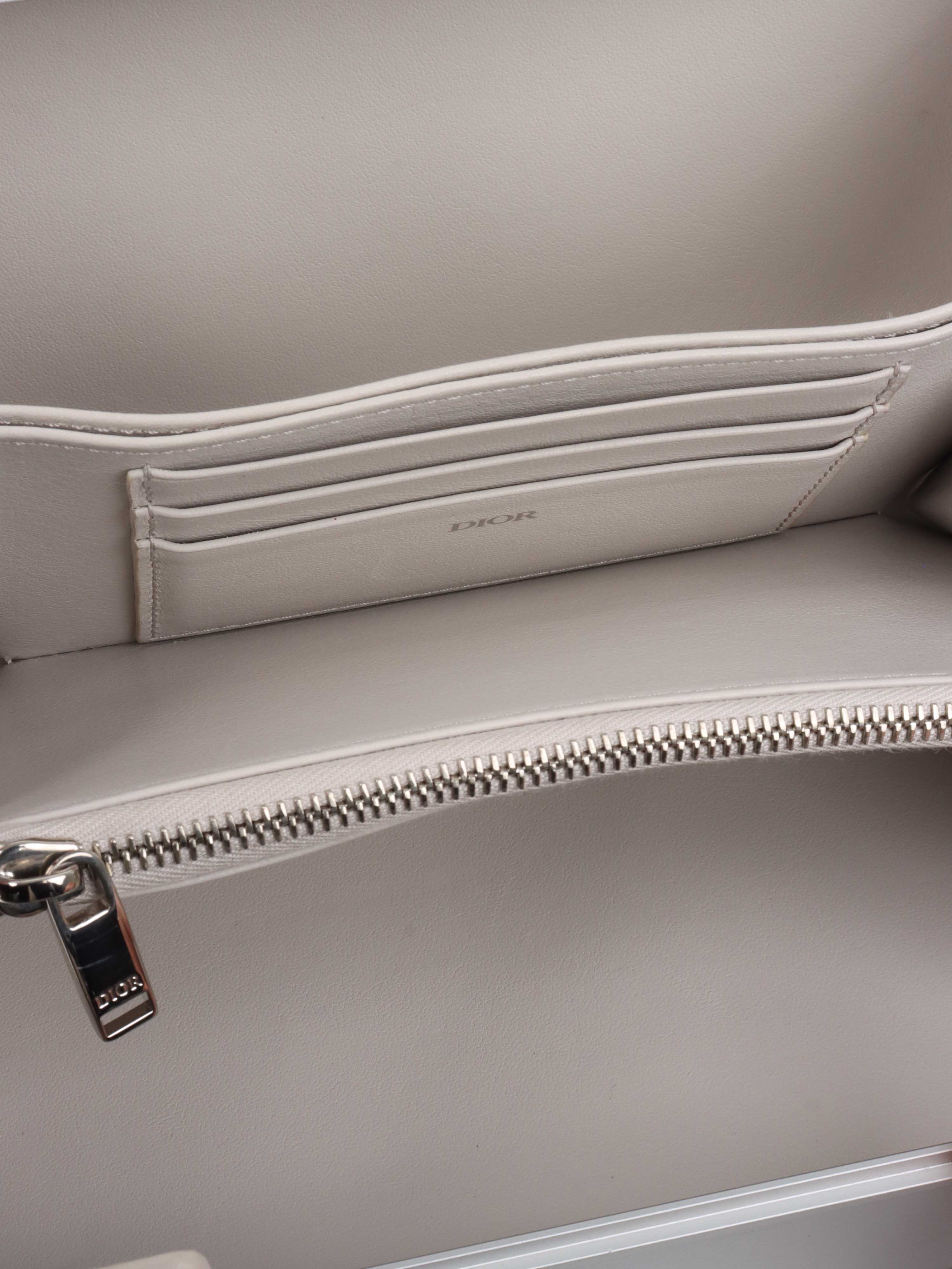 Dior x RIMOWA Silver Personal Clutch Case.