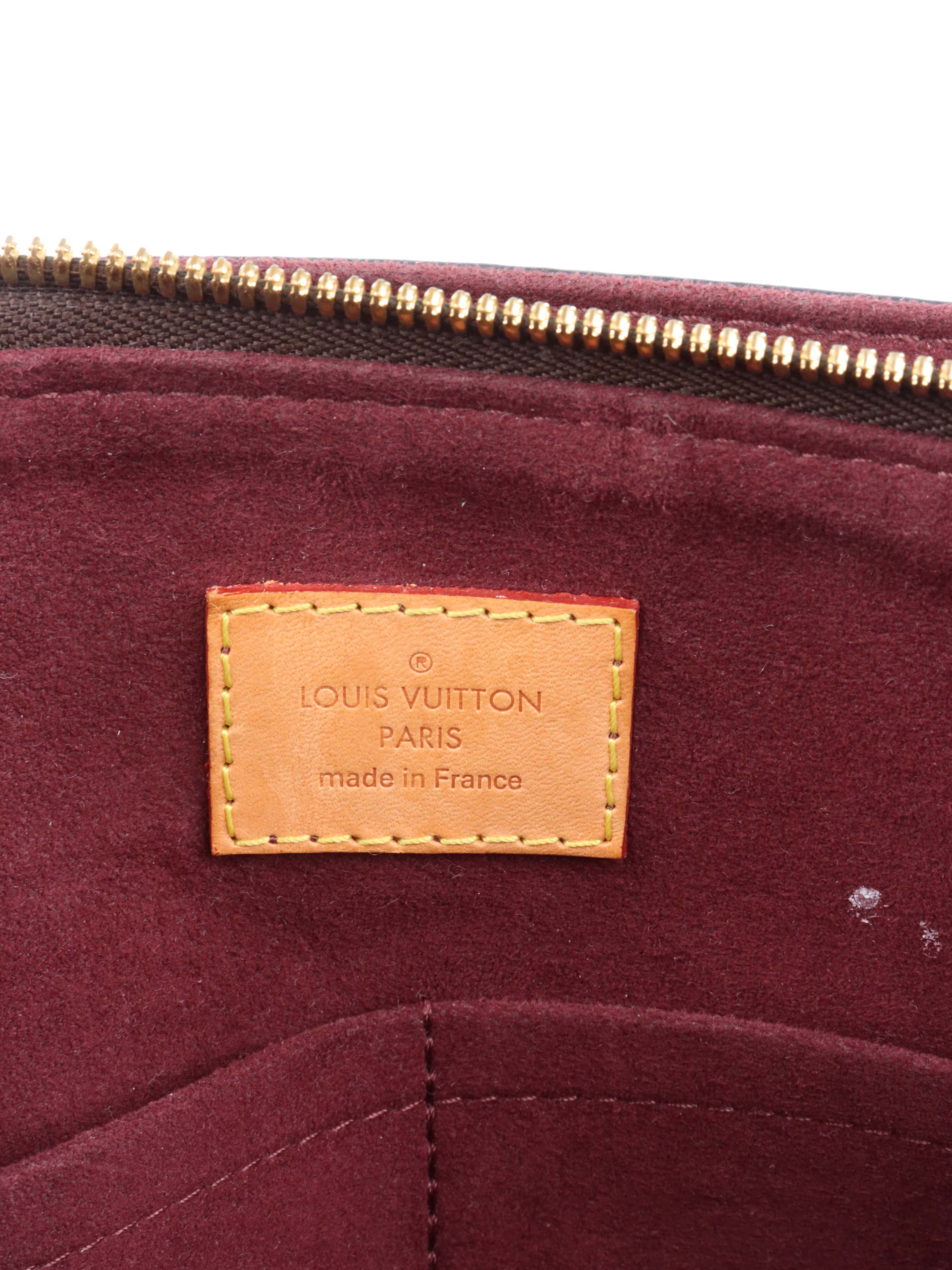 Louis Vuitton Monogram MM Flower Zipped Tote.