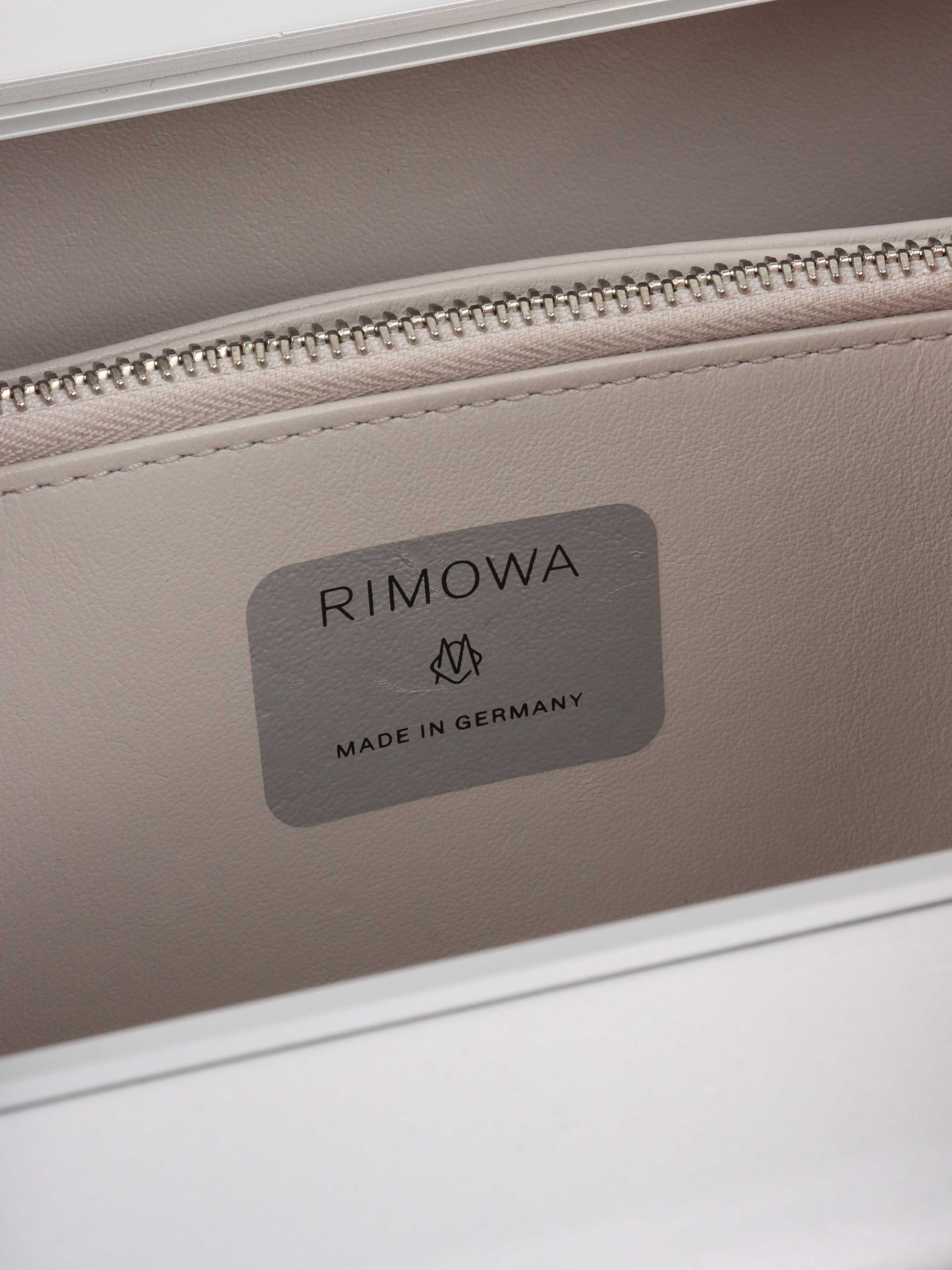 Dior x RIMOWA Silver Personal Clutch Case.