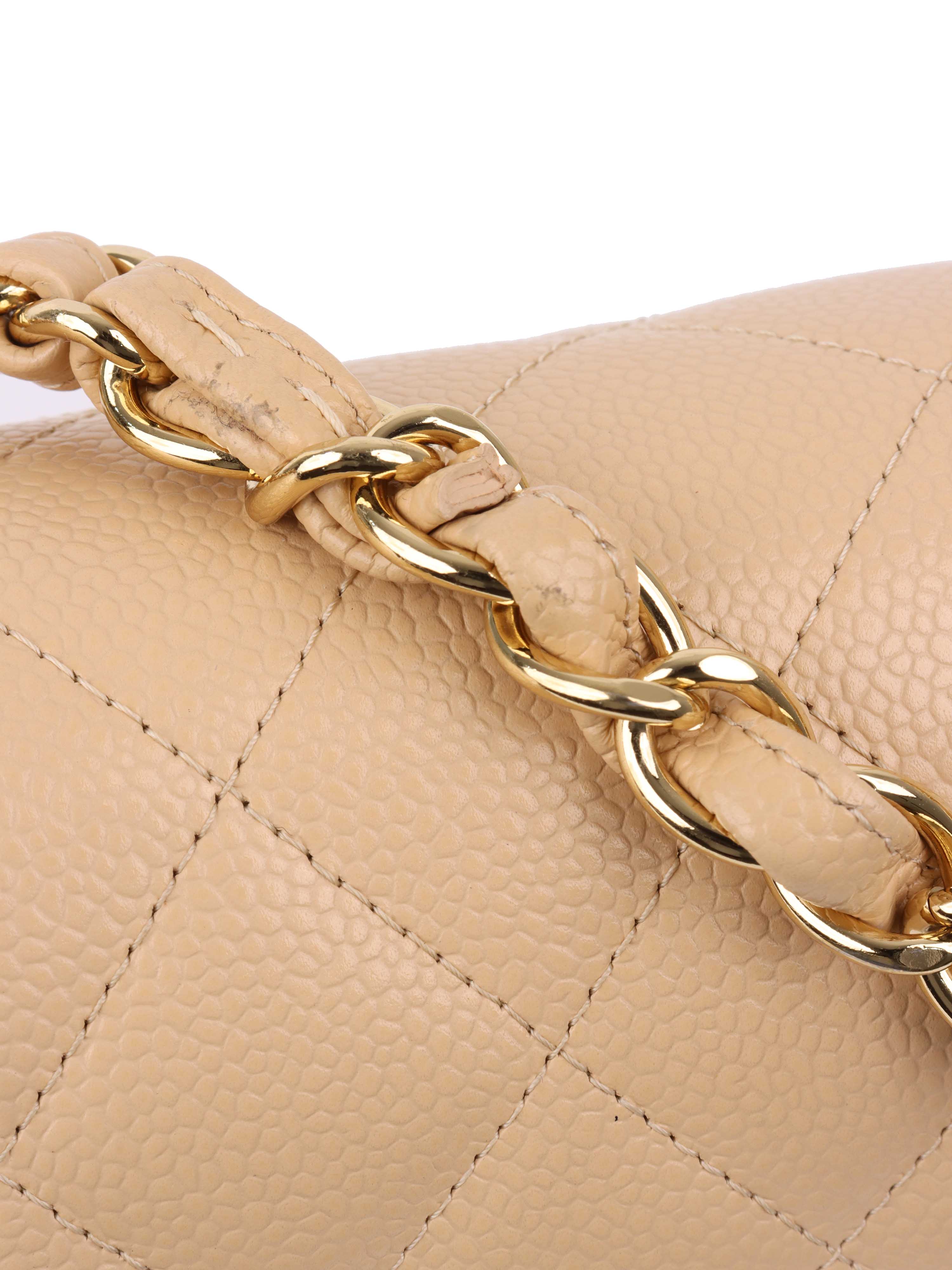 Chanel Beige Caviar Jumbo Classic Flap.