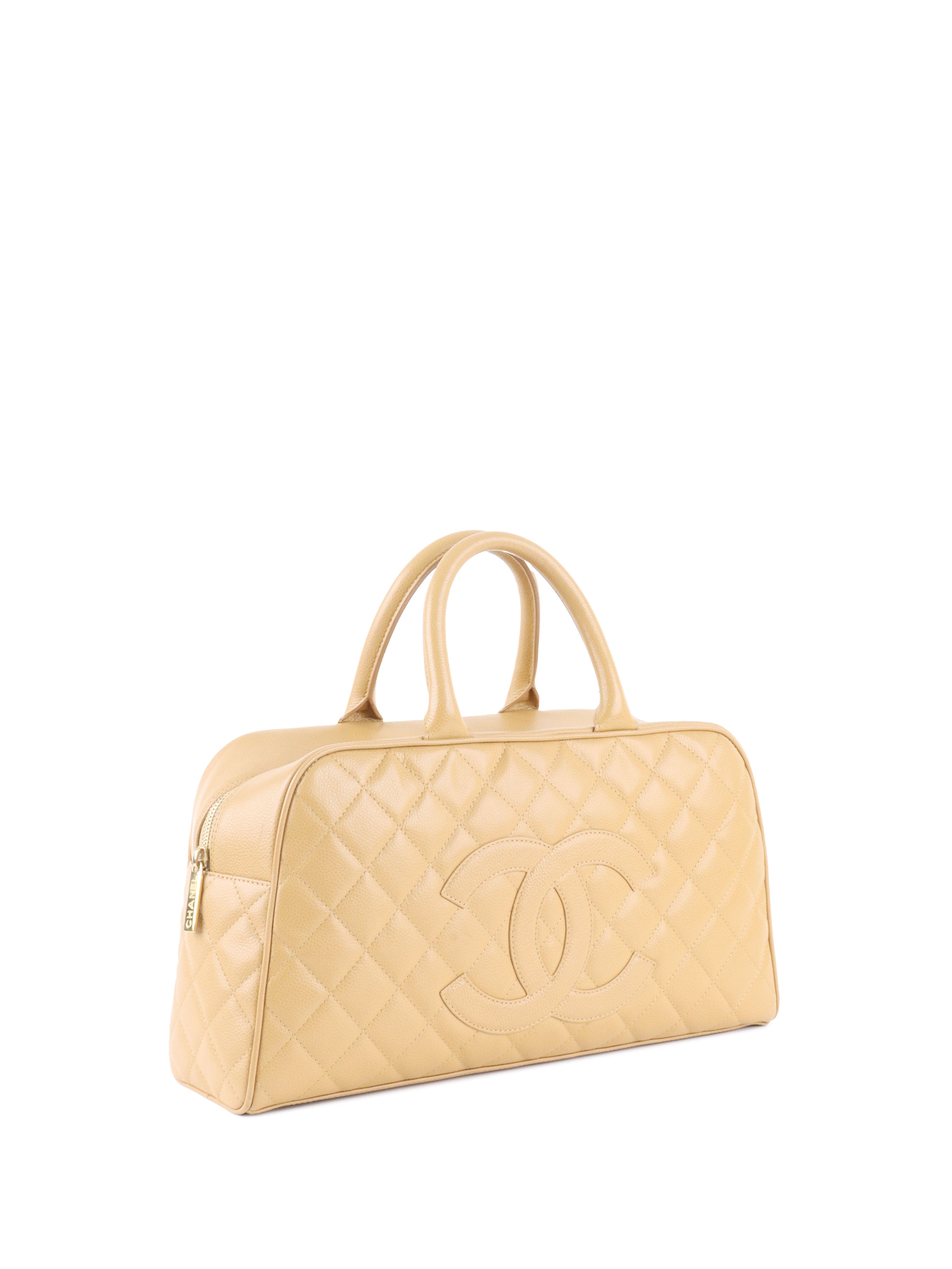 Chanel Beige Caviar Bowling Bag.