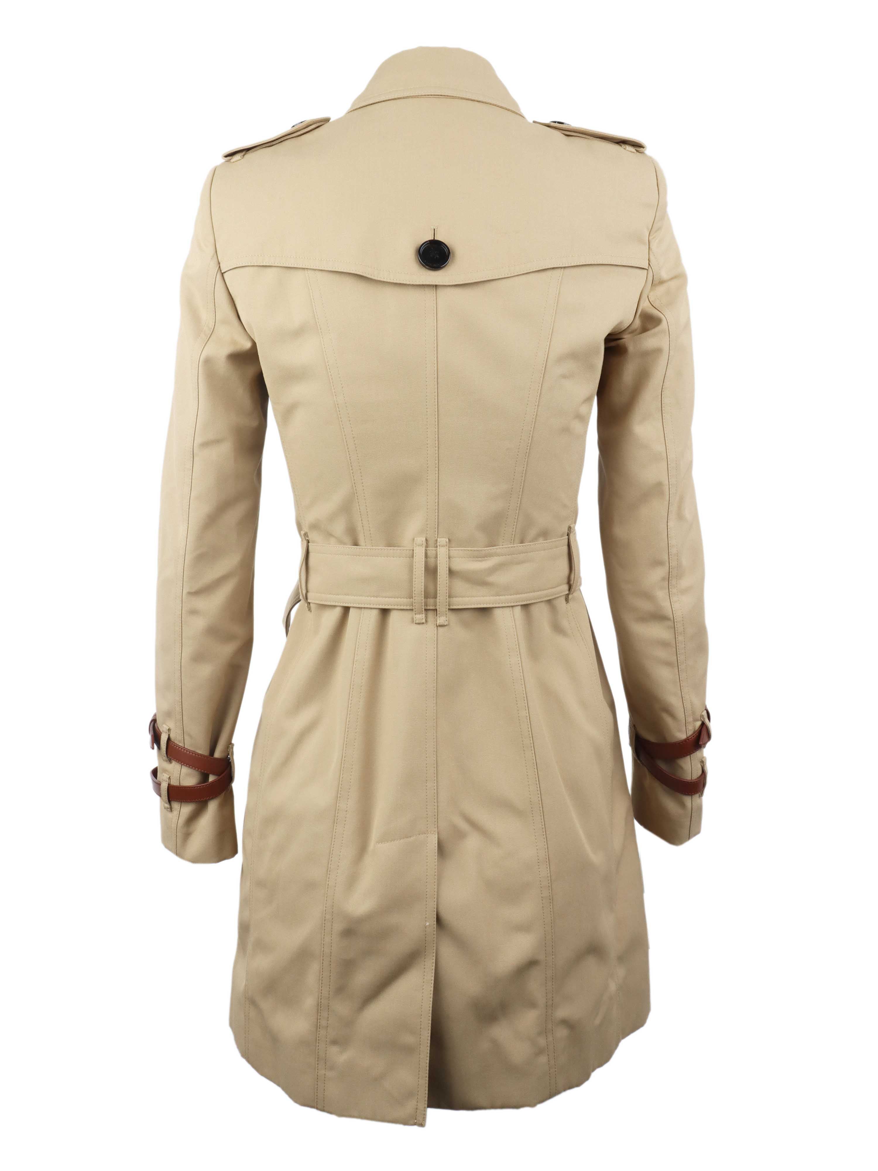 Burberry Tan Trench Coat with Leather Sleeve Straps.