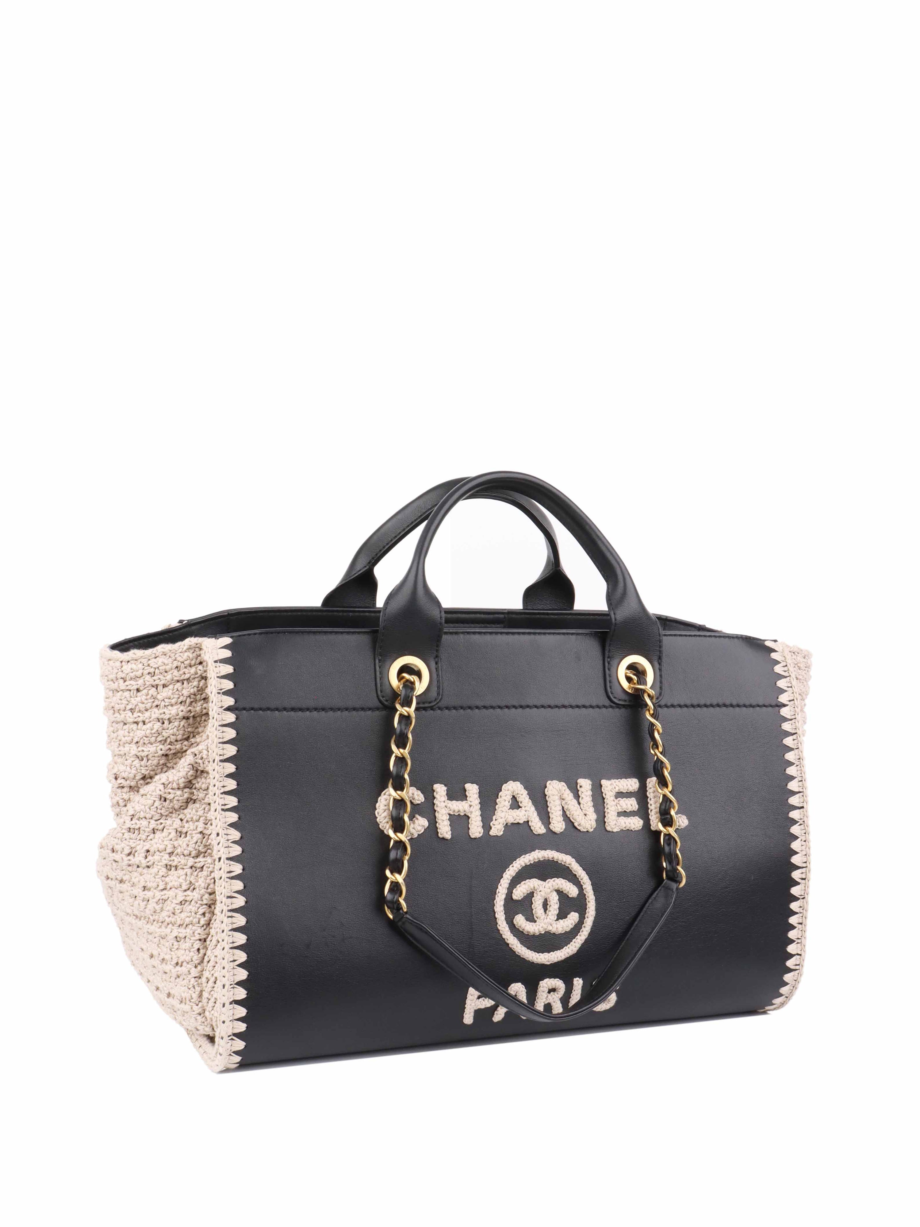 Chanel Black 
Raffia Deauville Tote.