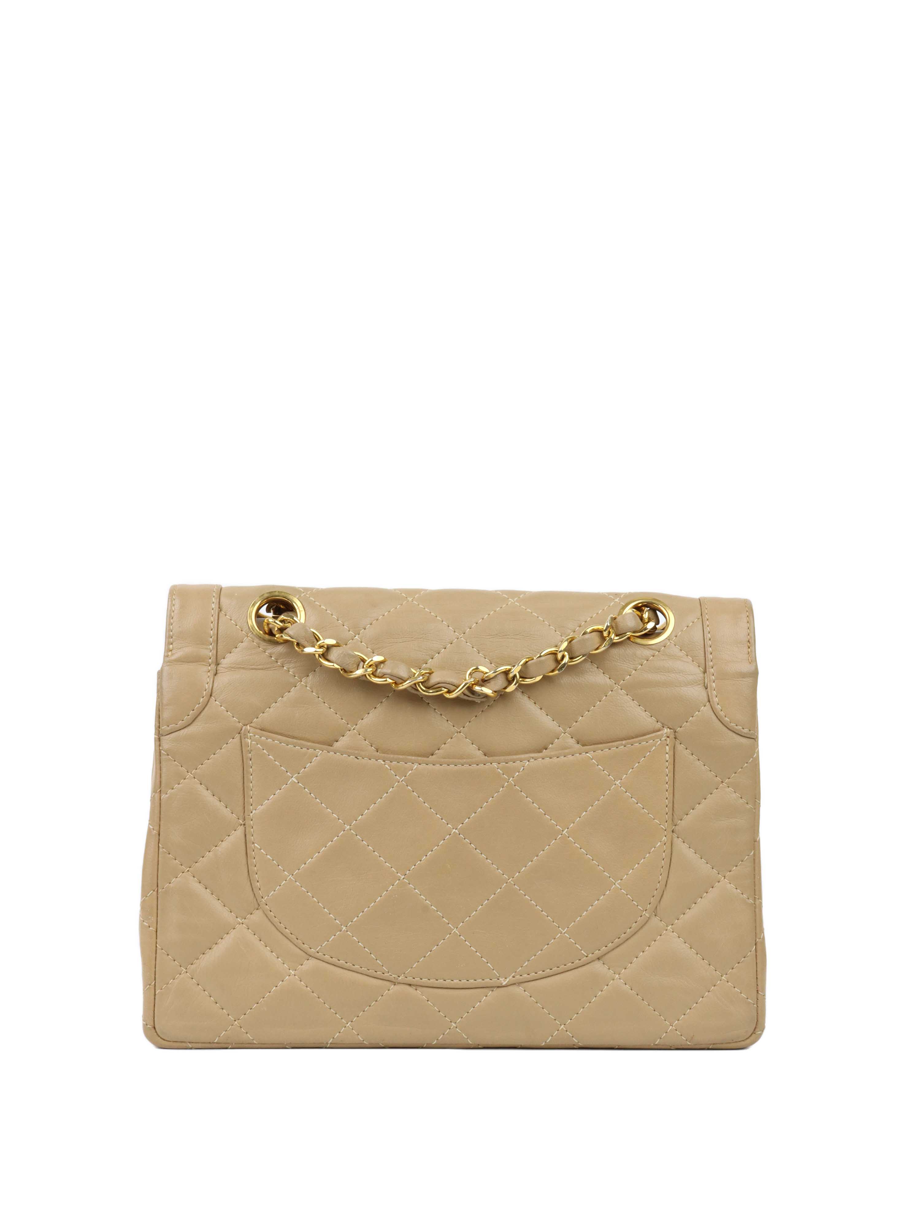 Chanel Vintage Two Toned Beige Flap Bag.