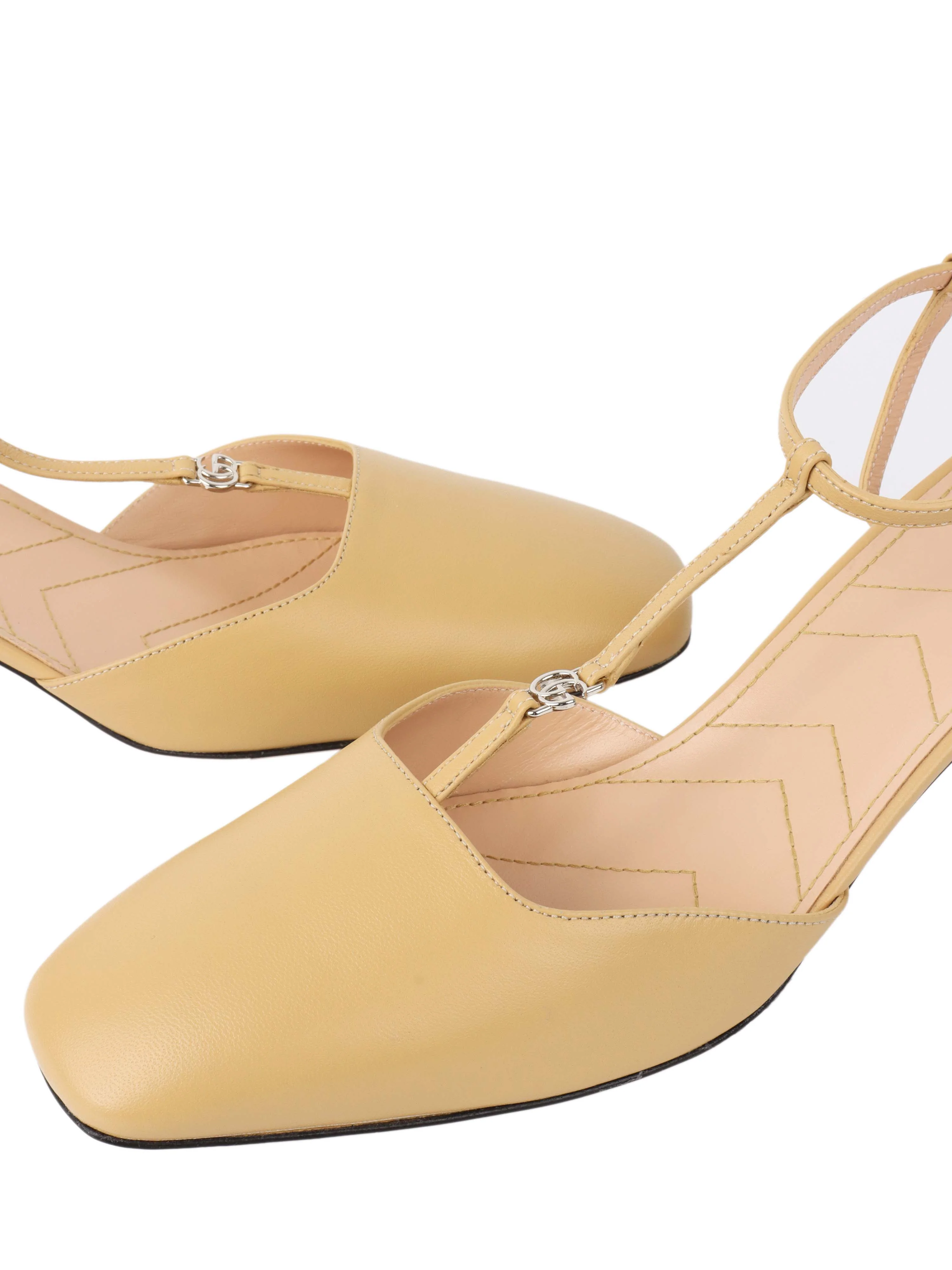 Gucci Beige Petite GG Slingback Pump.
