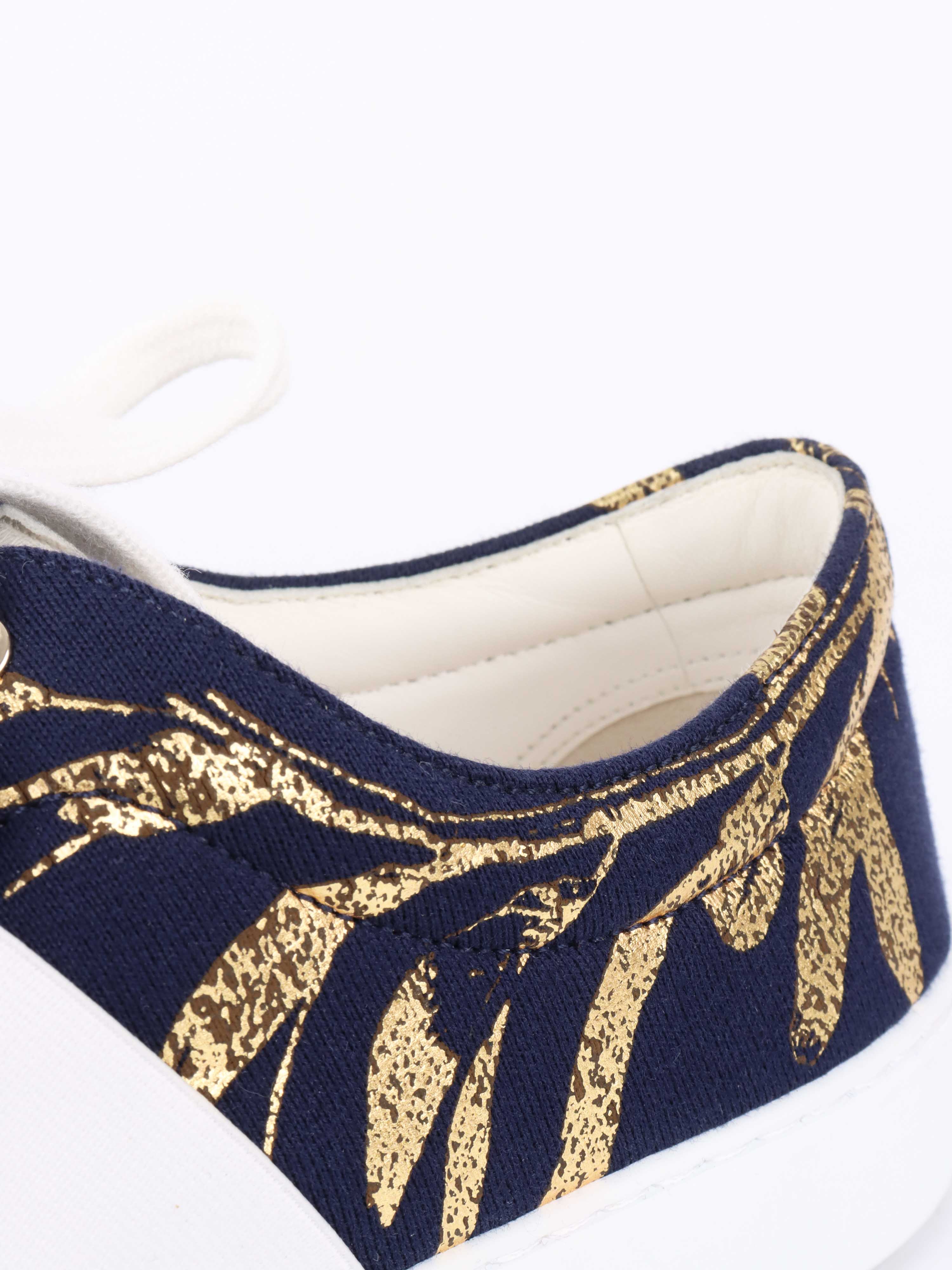 Chanel Navy Sneakers.