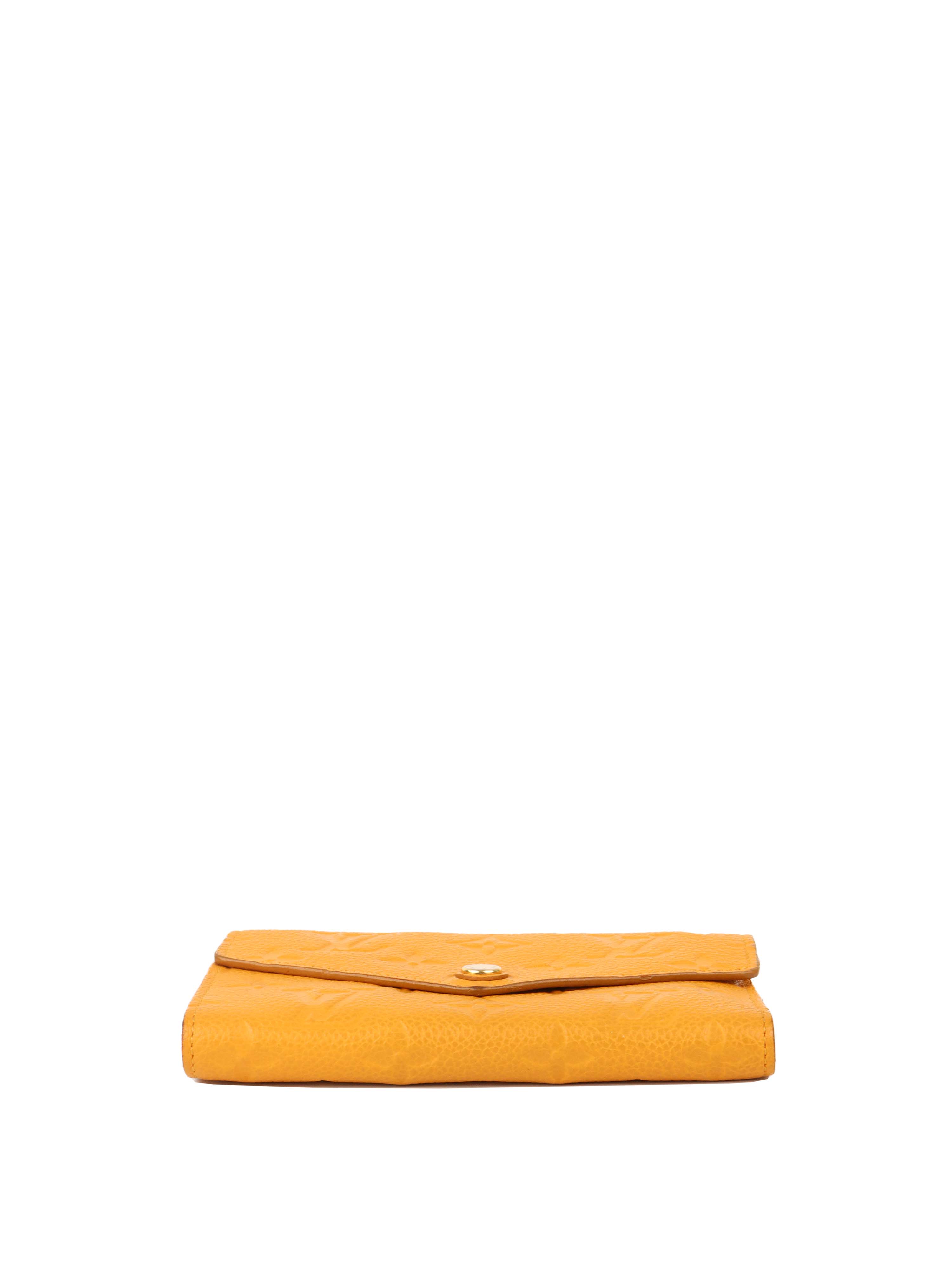 Louis Vuitton Saffran Empreinte Leather Compact Wallet.