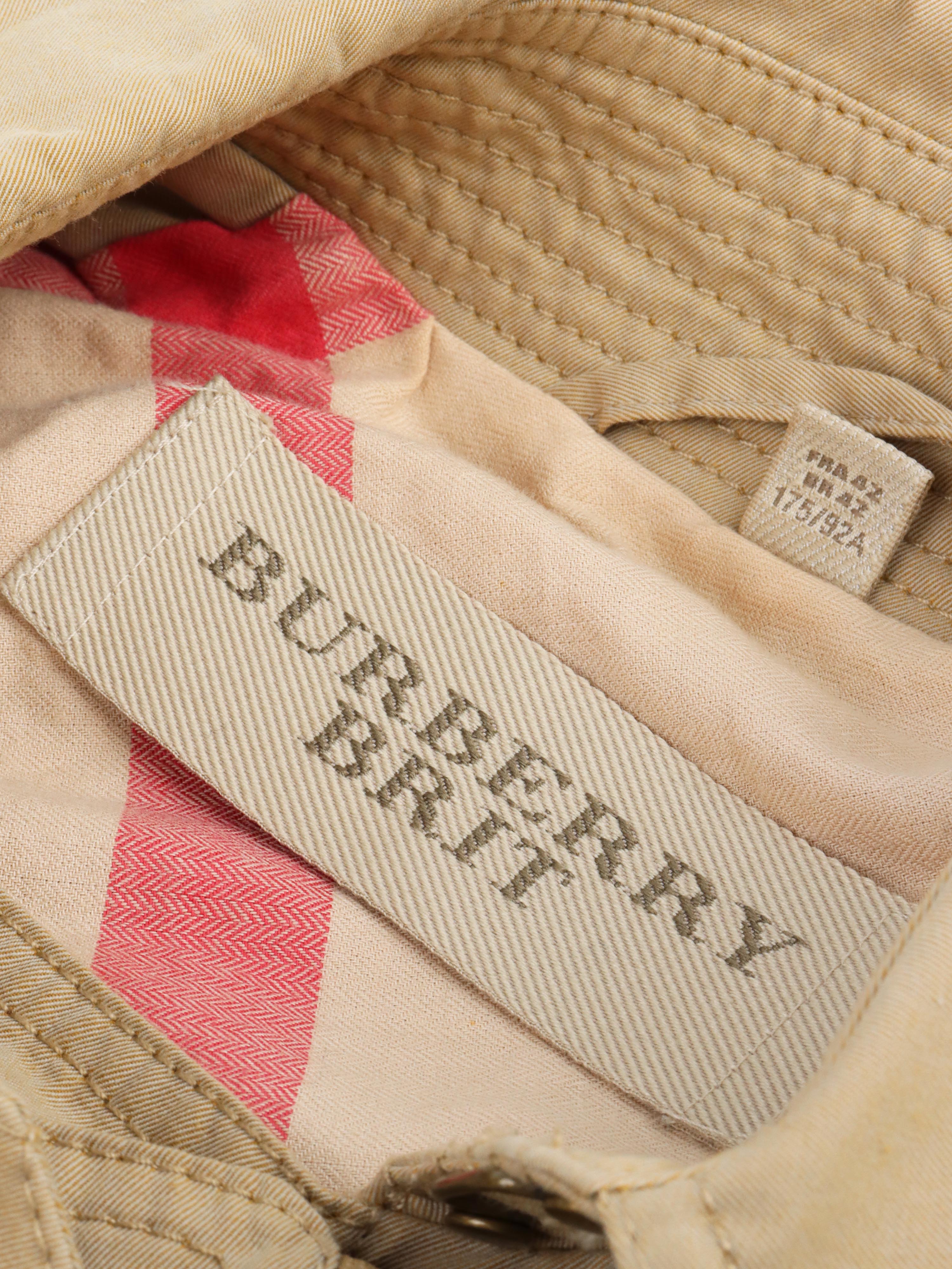 Burberry Short Tan Trench Coat.