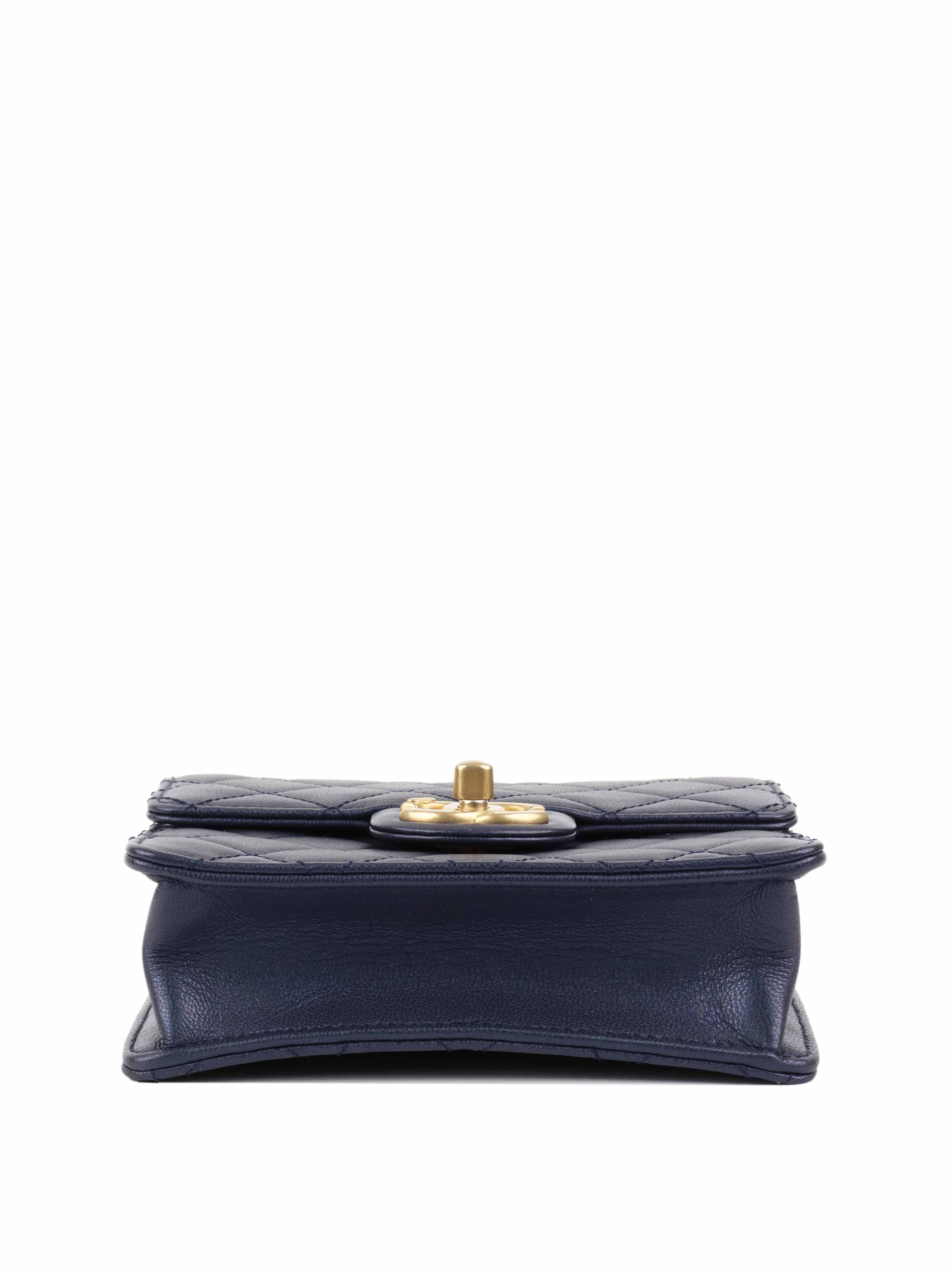 Chanel Navy Iridescent Flap Bag with Pearls.