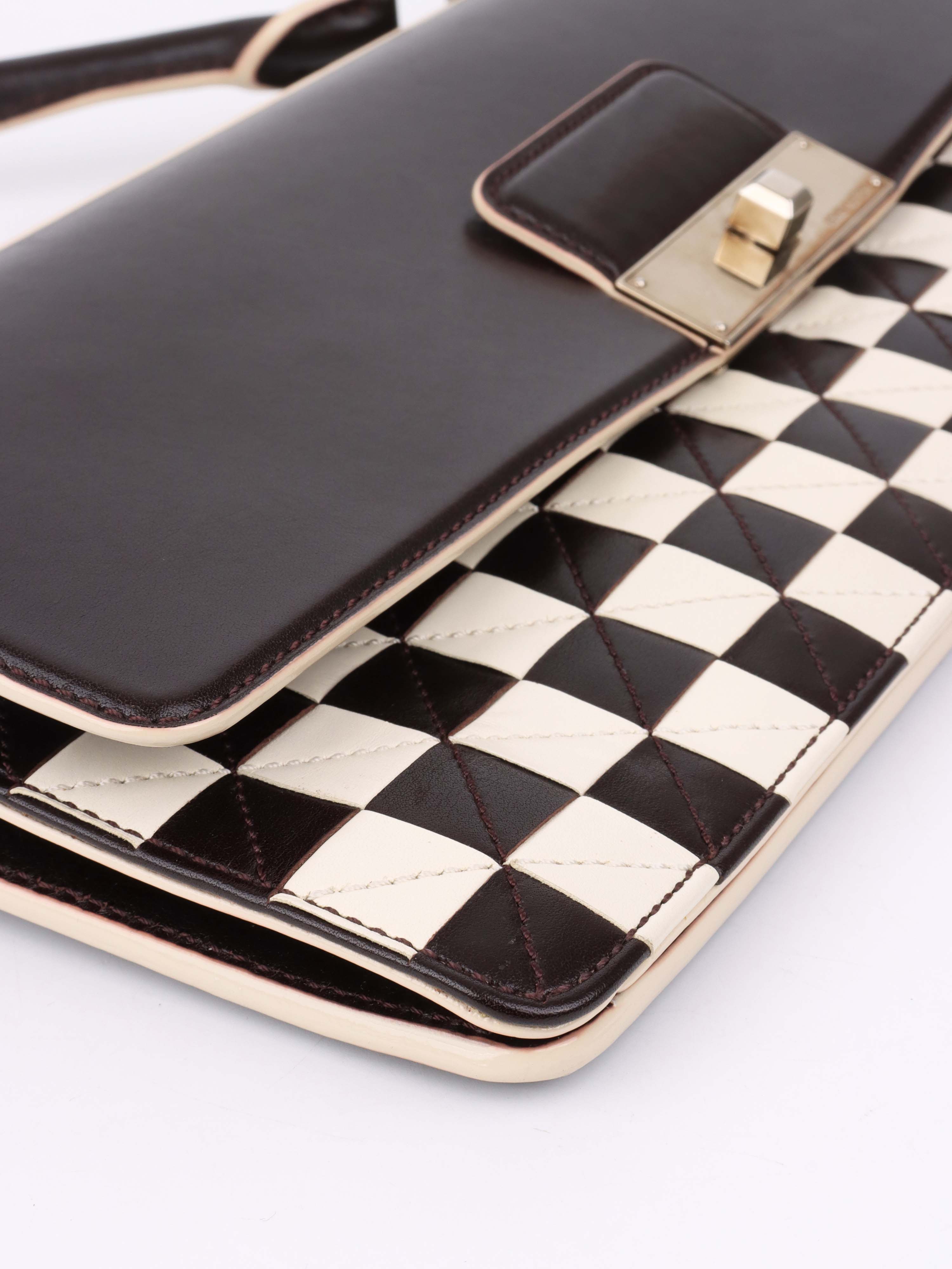 Louis Vuitton Black 
White Chess Board Clutch.