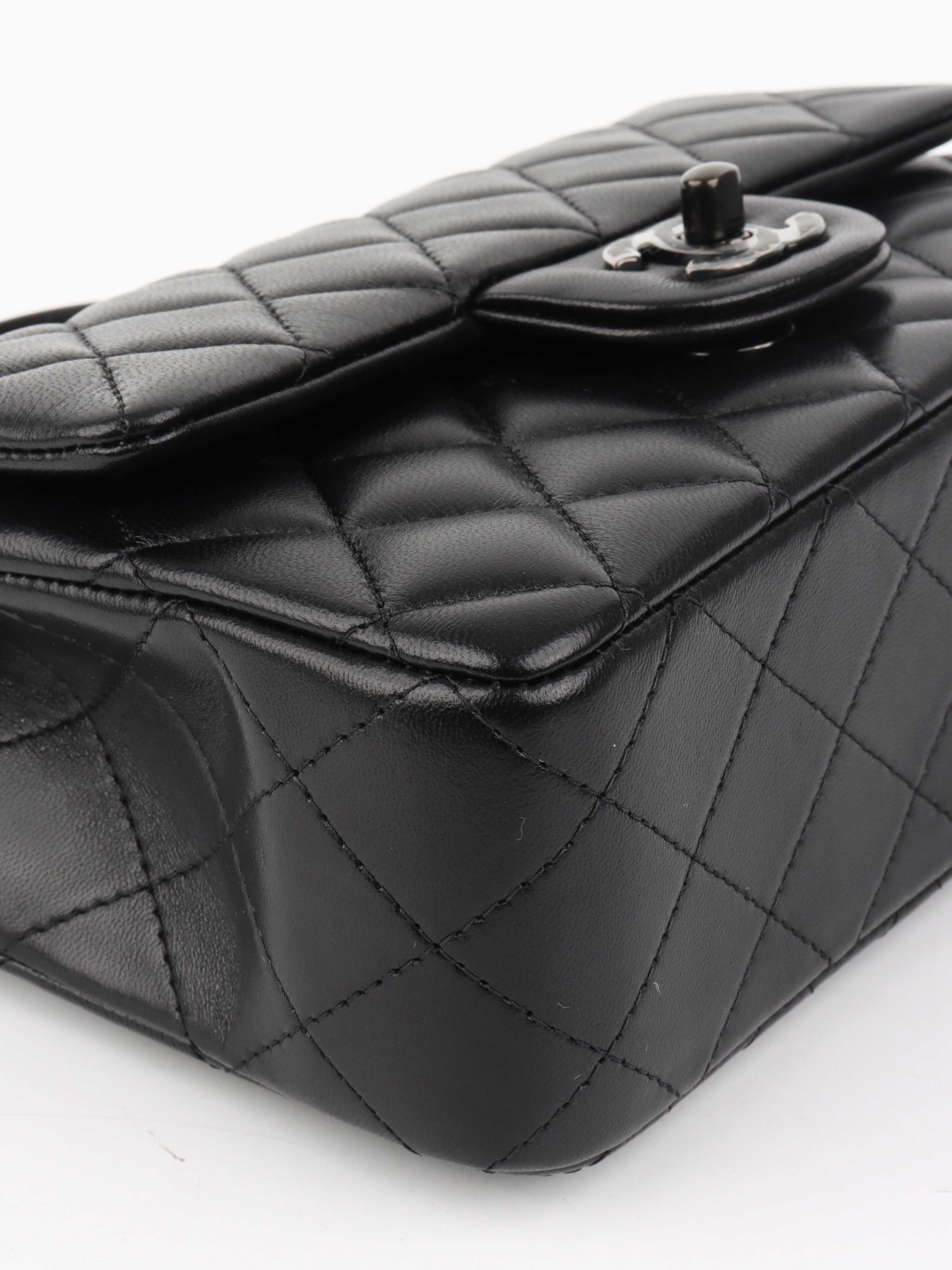 Chanel All Black Rectangular Classic Flap with Handle.