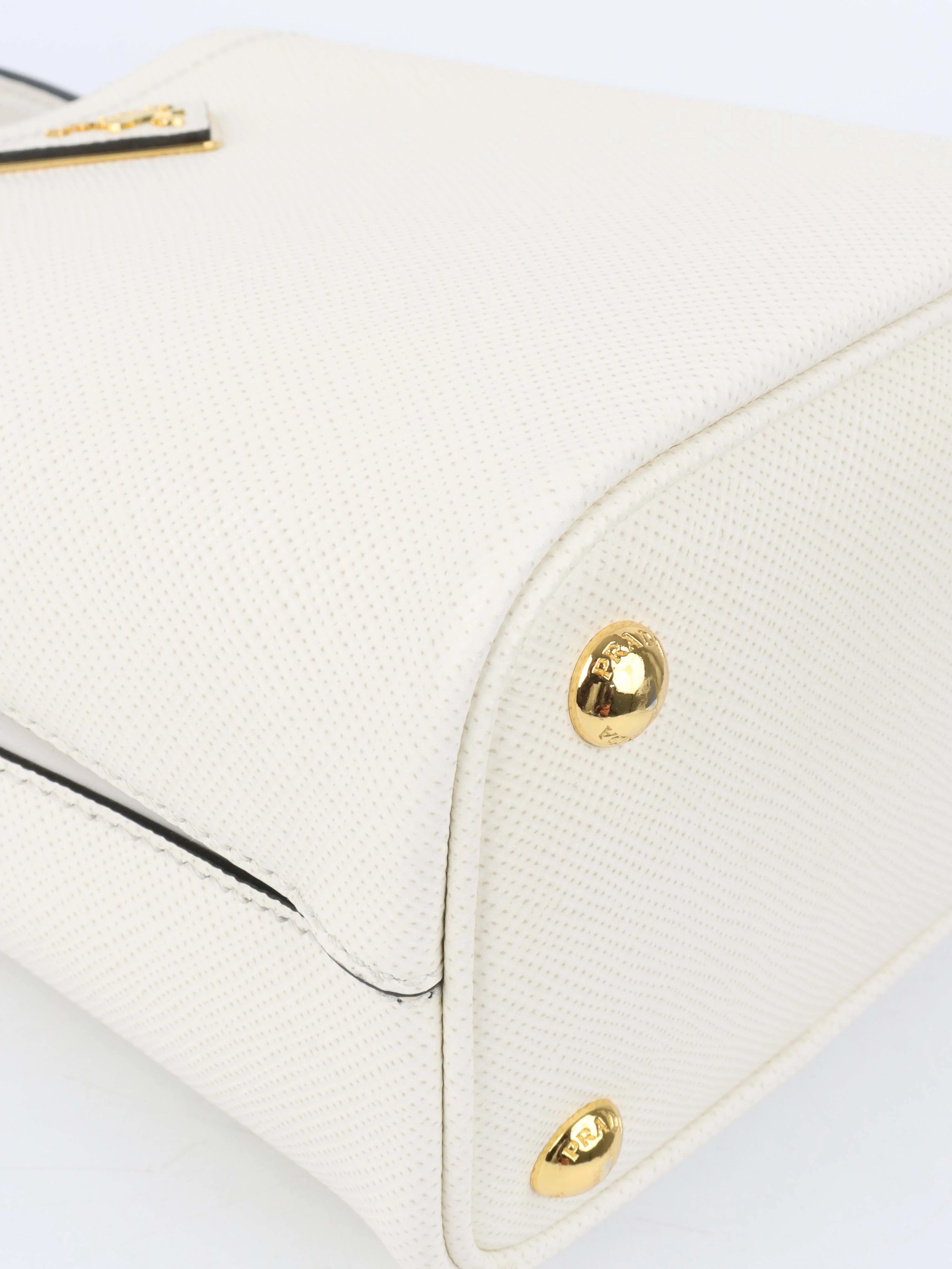 Prada Small Saffiano White Panier Bag.