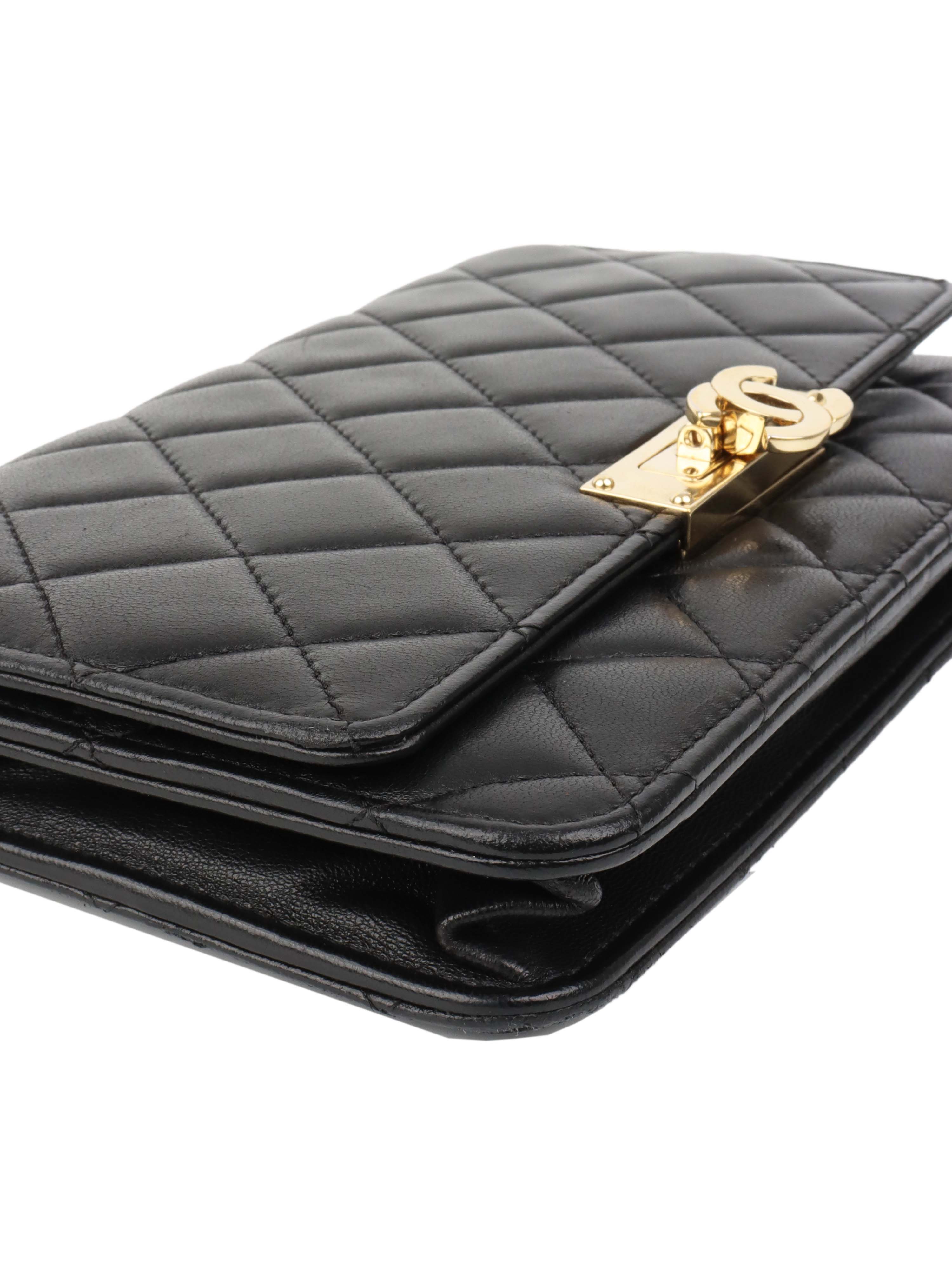 Chanel Black Buckled Lambskin Wallet on Chain.