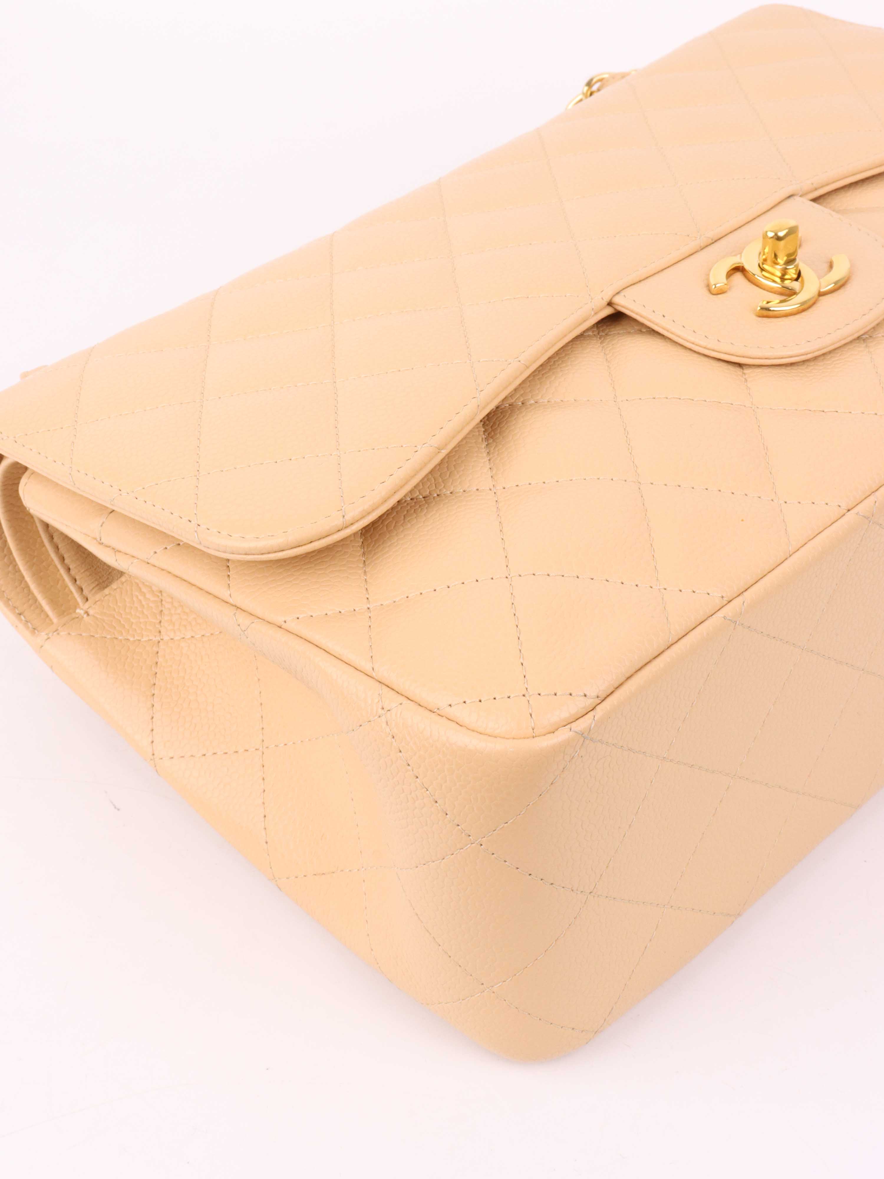 Chanel Beige Caviar Jumbo Classic Flap.