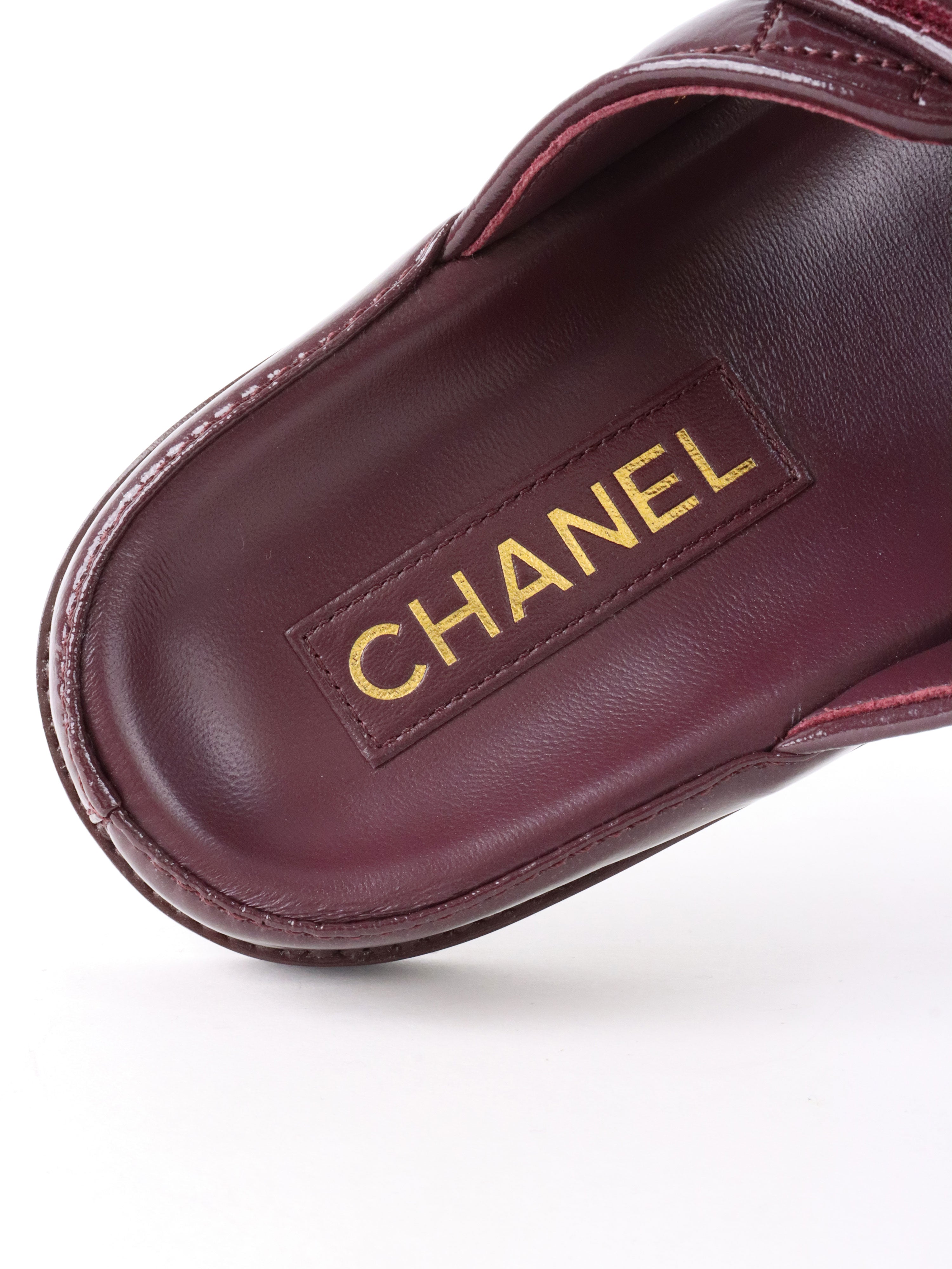 Chanel 21C Burgundy Red Patent Gold CC Logo Mule Slides.