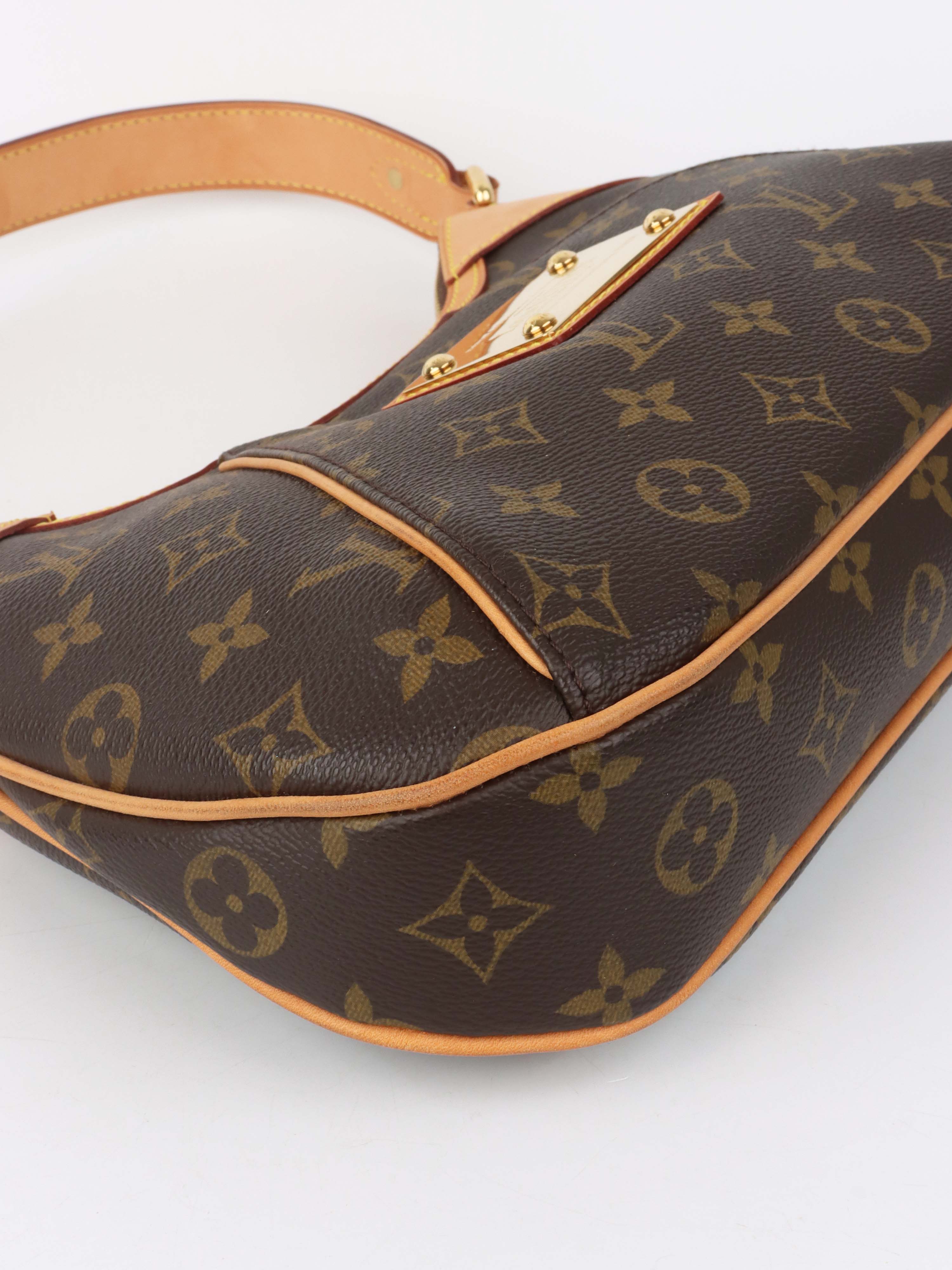 Louis Vuitton Brown Monogram Thames PM Bag.