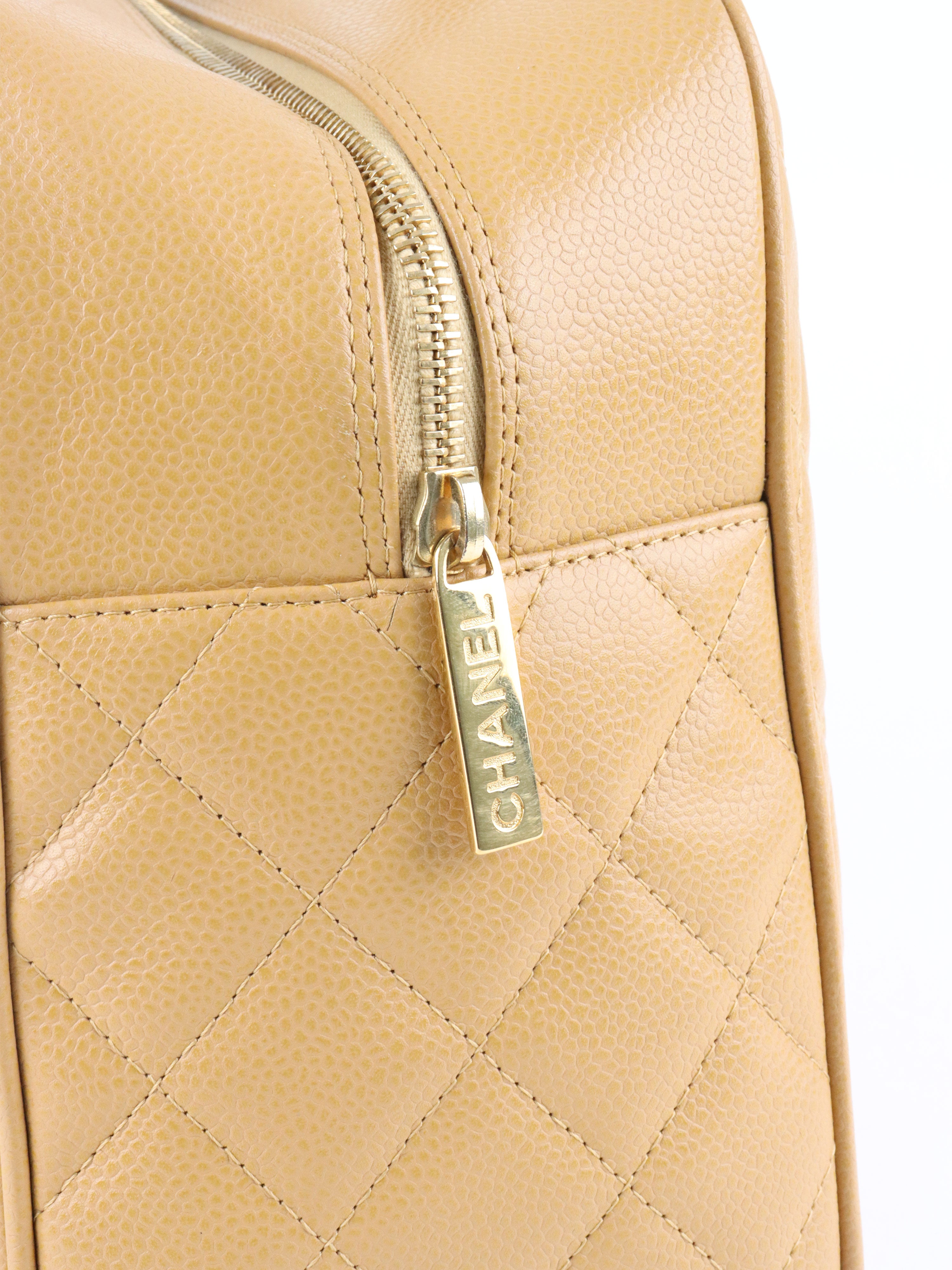 Chanel Beige Caviar Bowling Bag.