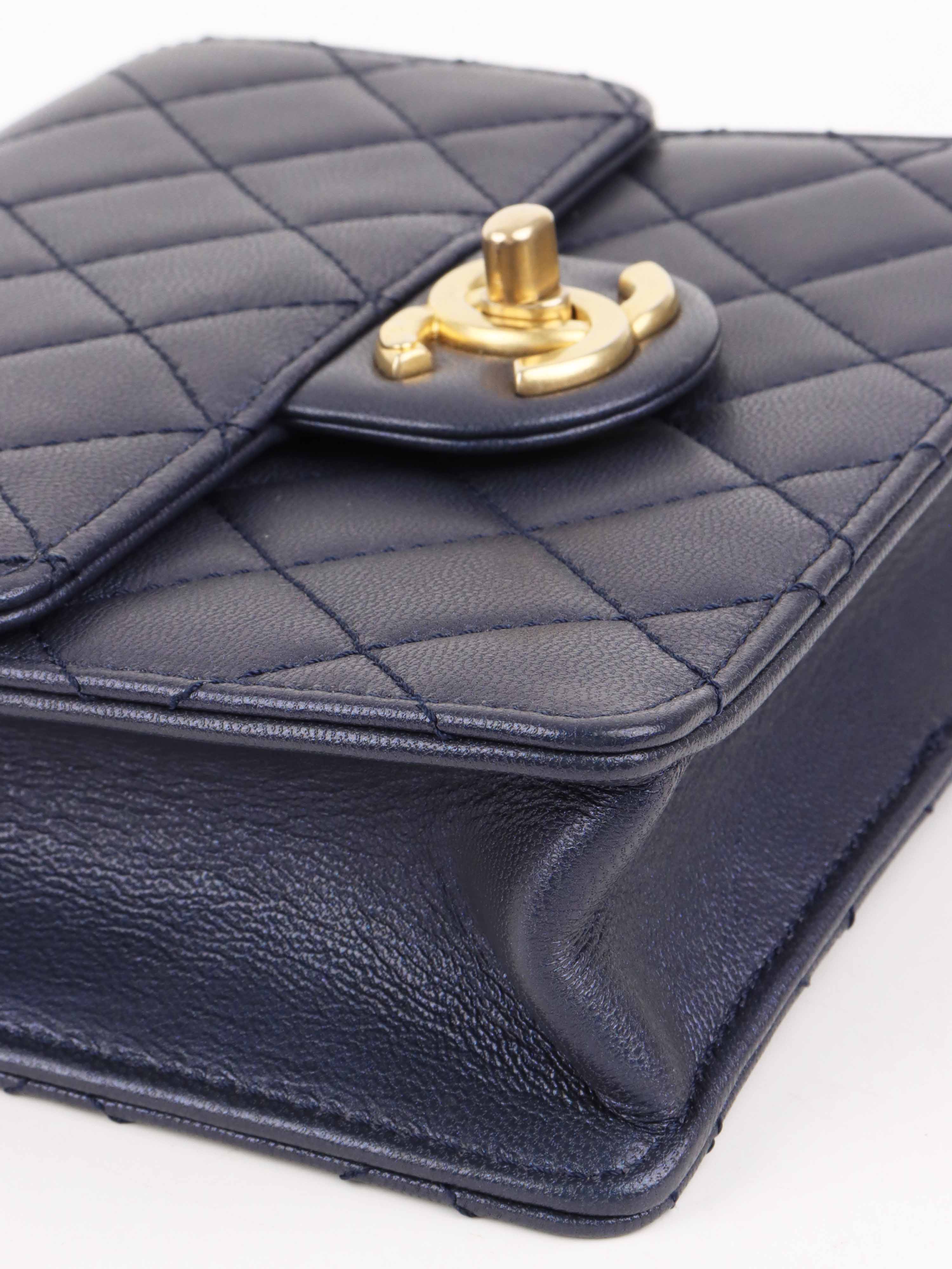 Chanel Navy Iridescent Flap Bag with Pearls.