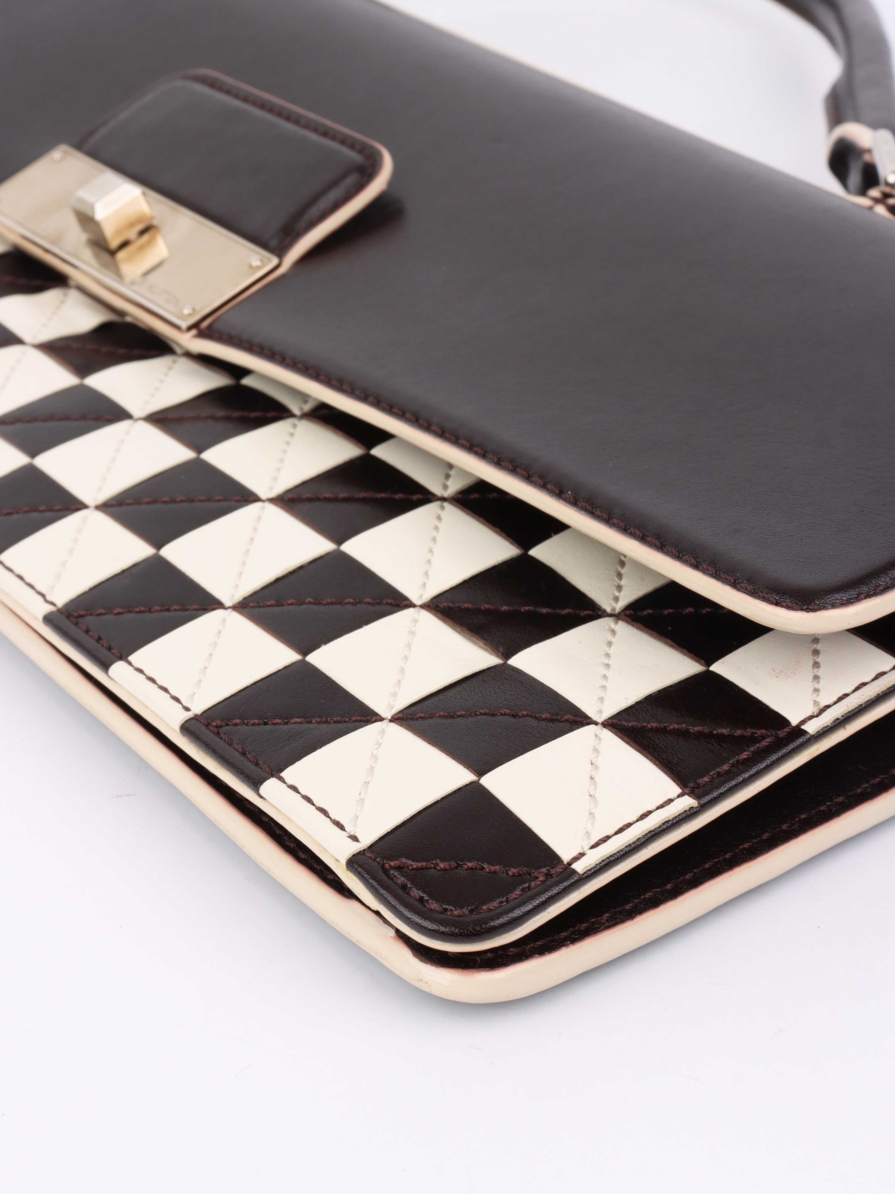 Louis Vuitton Black 
White Chess Board Clutch.