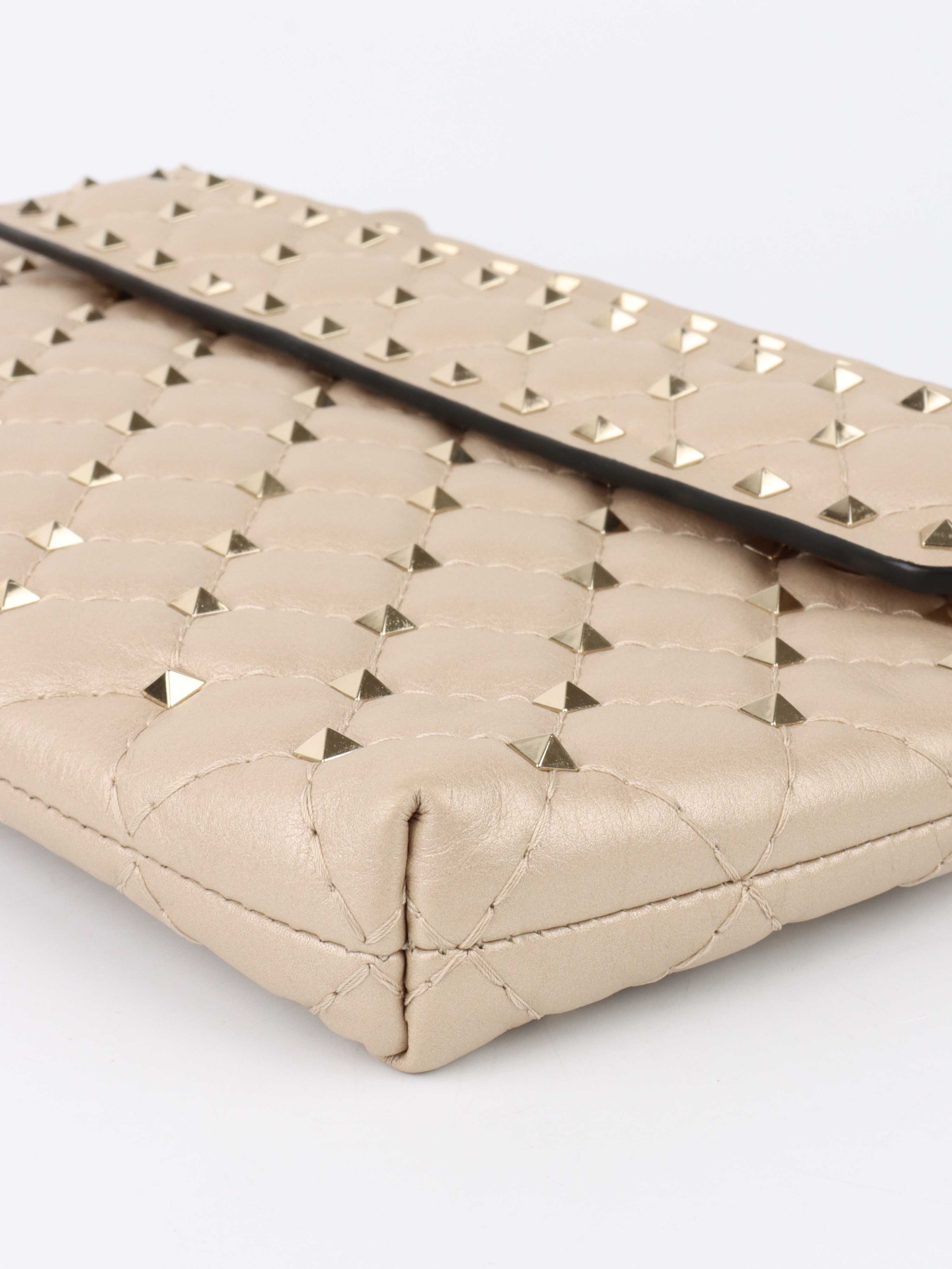 Valentino Gold Rockstud Clutch.