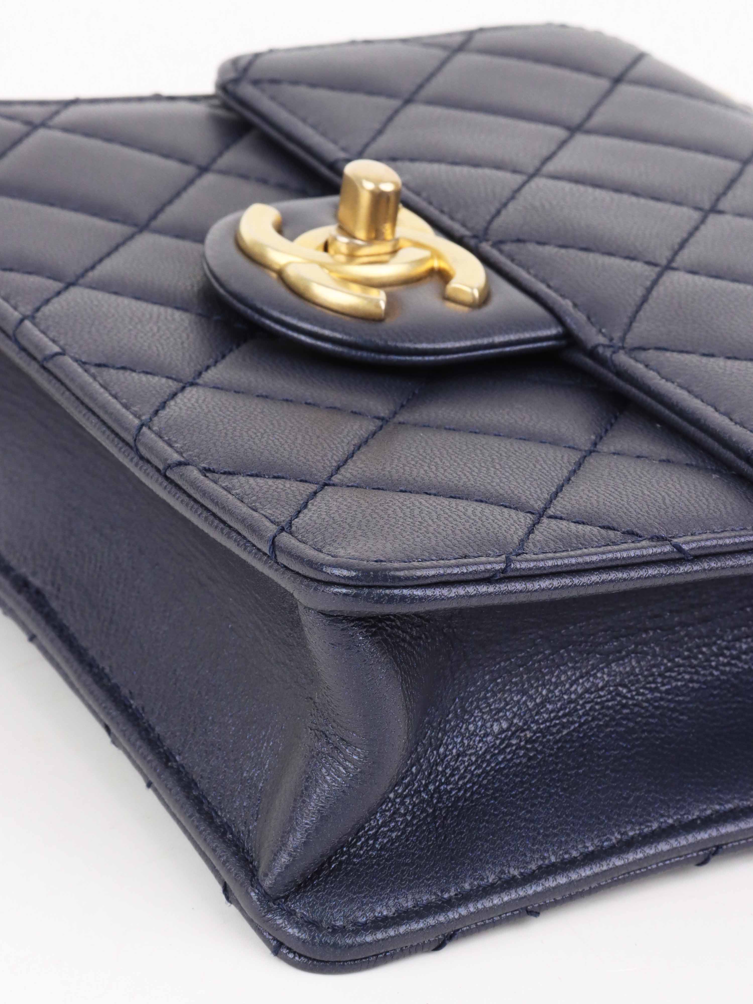 Chanel Navy Iridescent Flap Bag with Pearls.