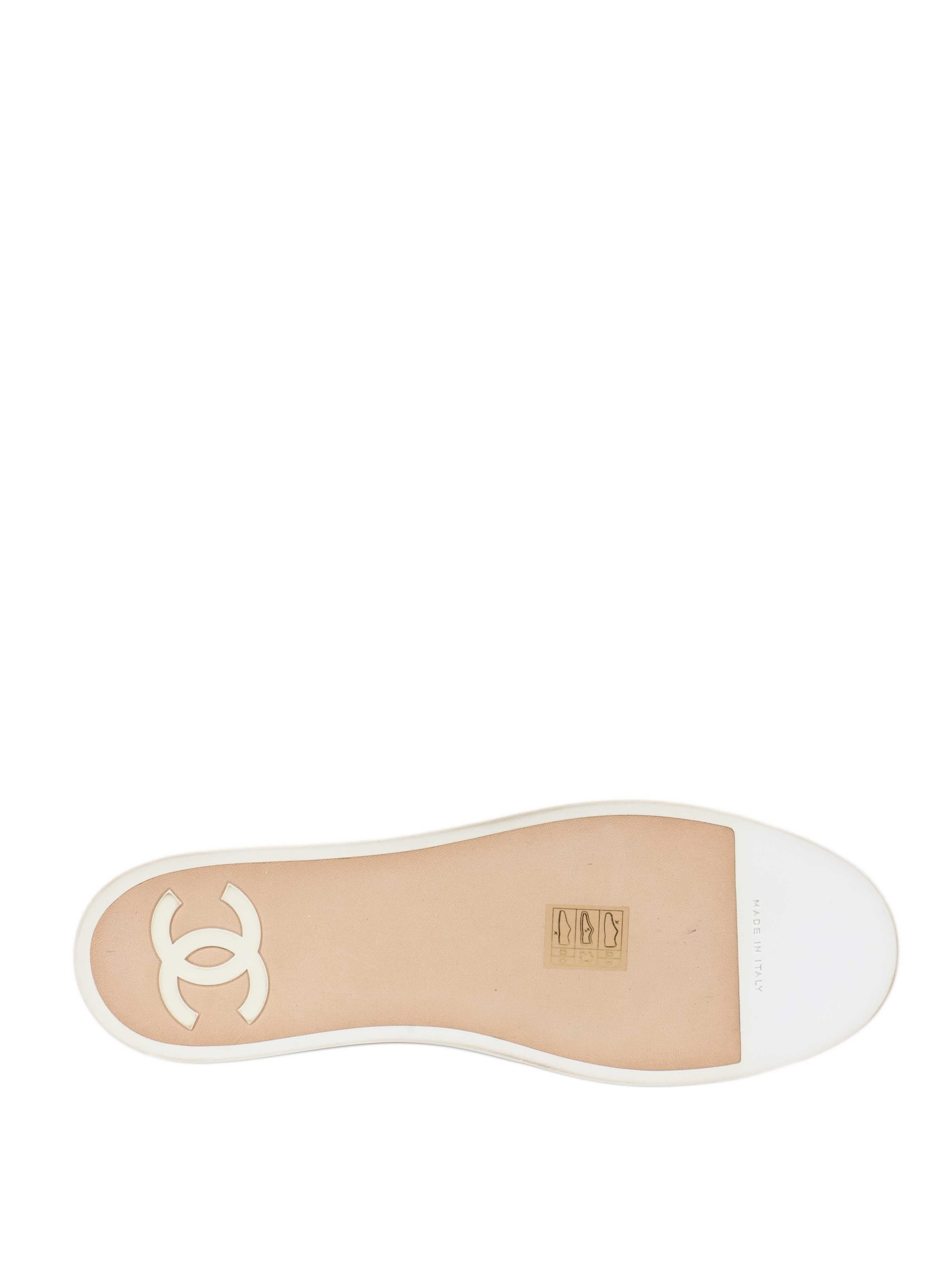 Chanel Navy Sneakers.