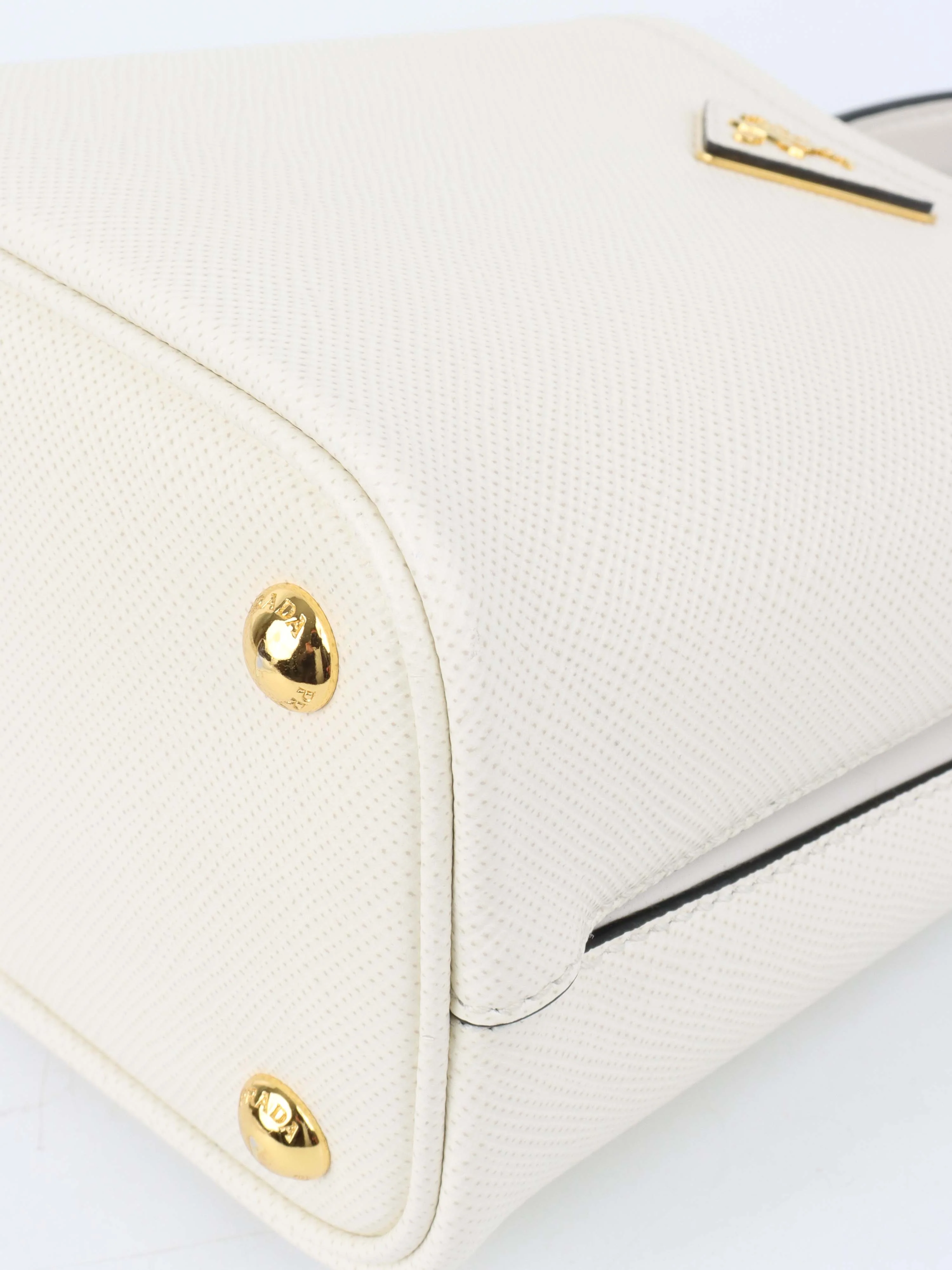 Prada Small Saffiano White Panier Bag.