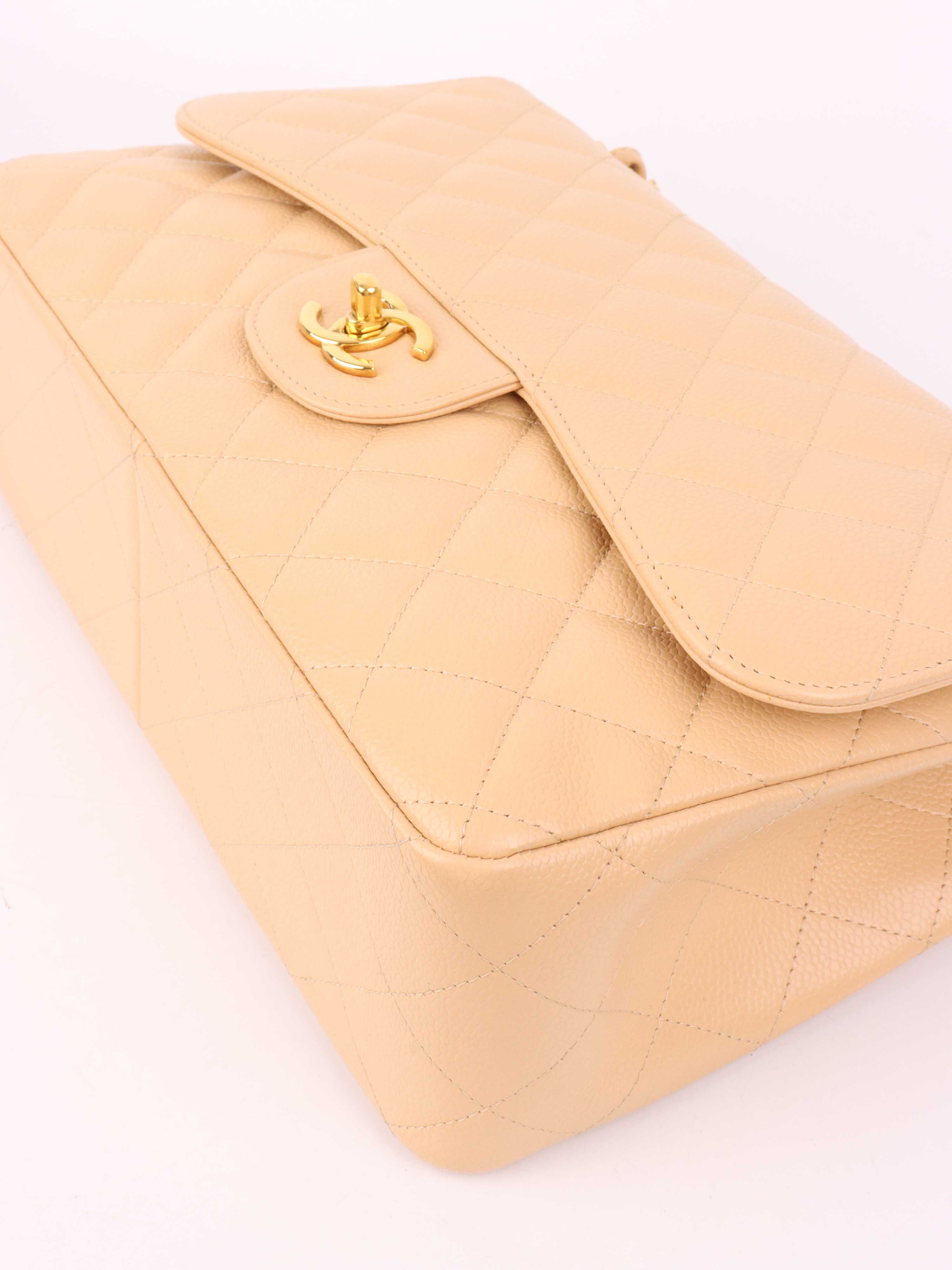 Chanel Beige Caviar Jumbo Classic Flap.