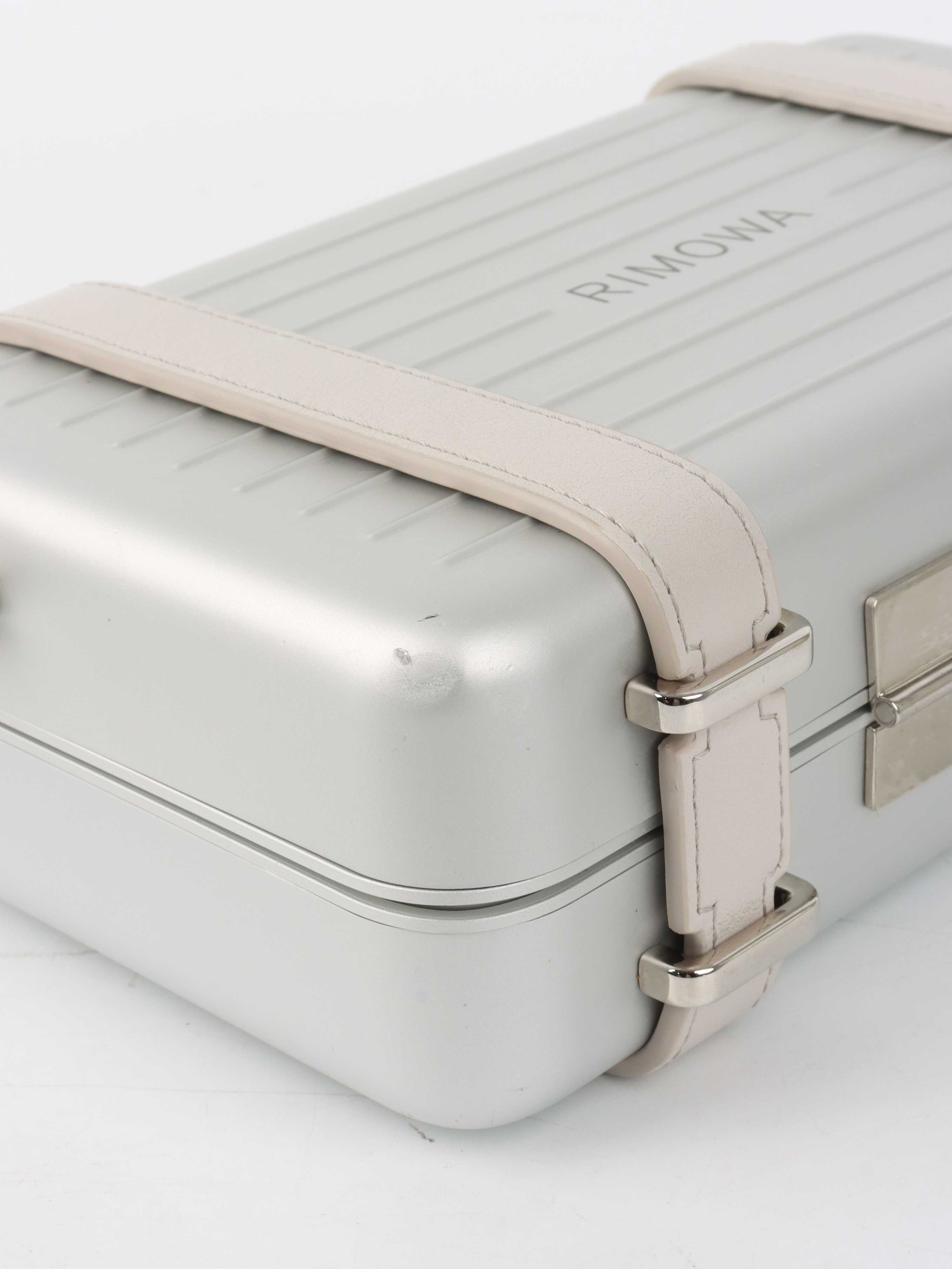 Dior x RIMOWA Silver Personal Clutch Case.