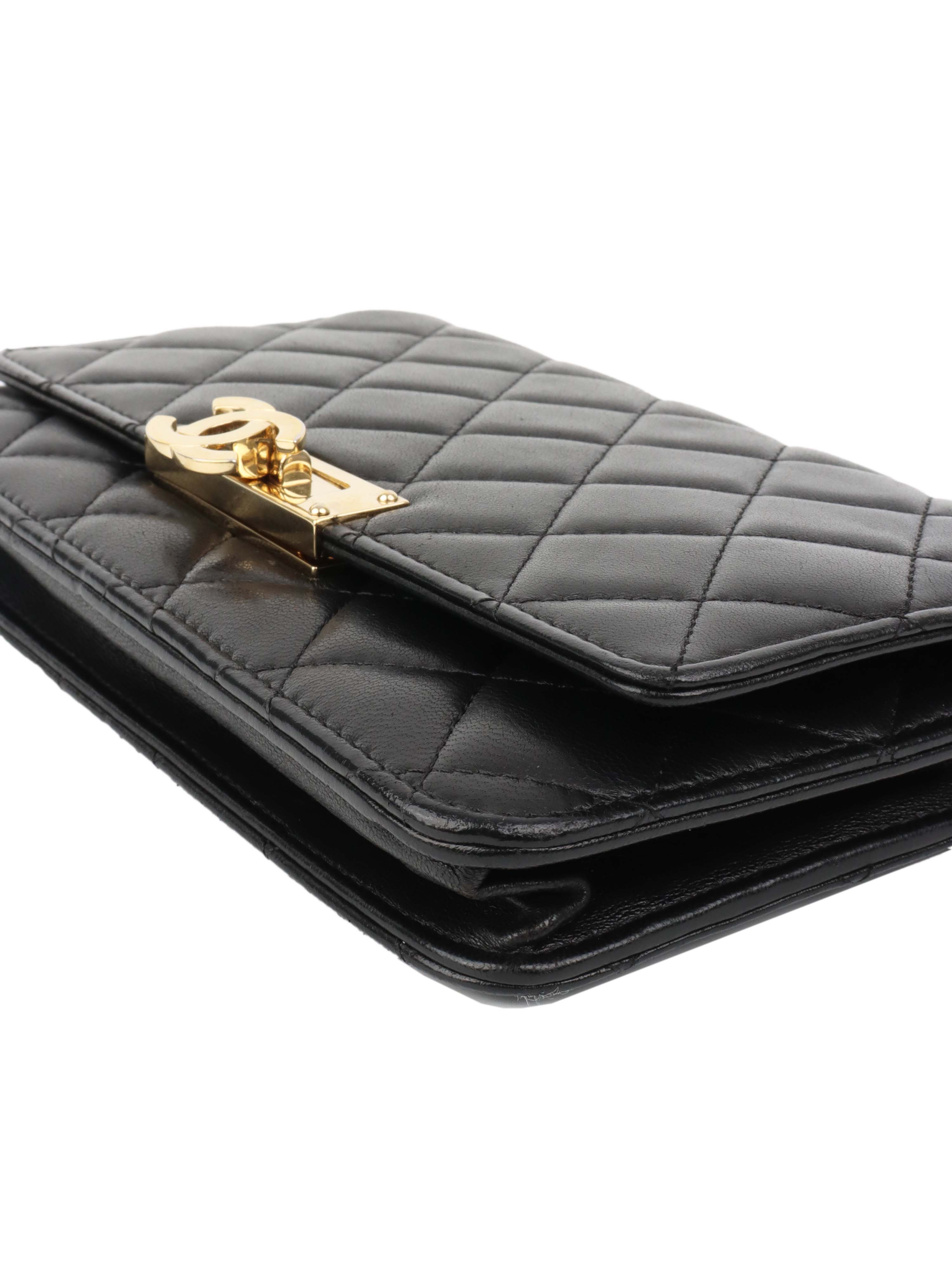 Chanel Black Buckled Lambskin Wallet on Chain.