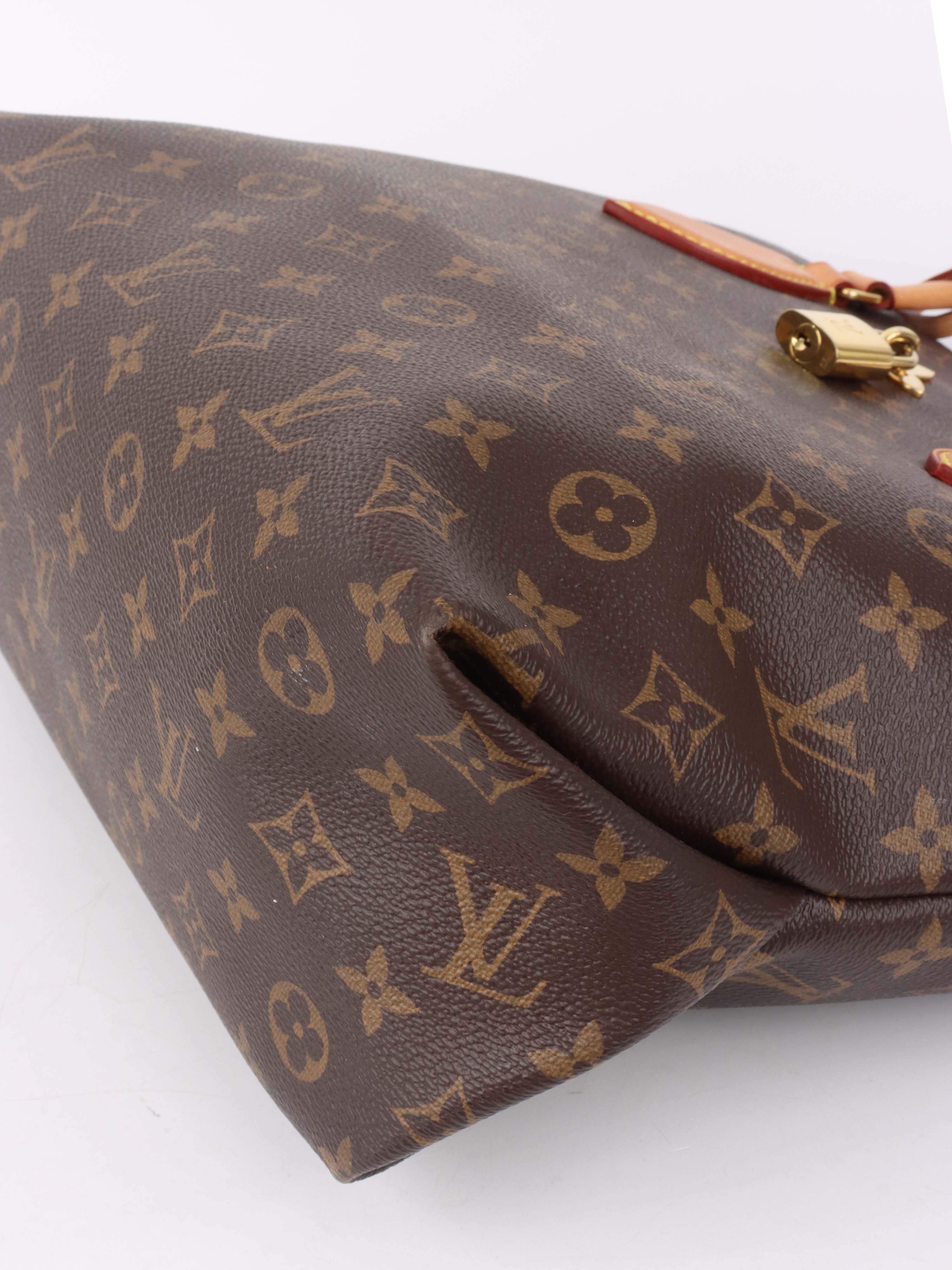 Louis Vuitton Monogram MM Flower Zipped Tote.