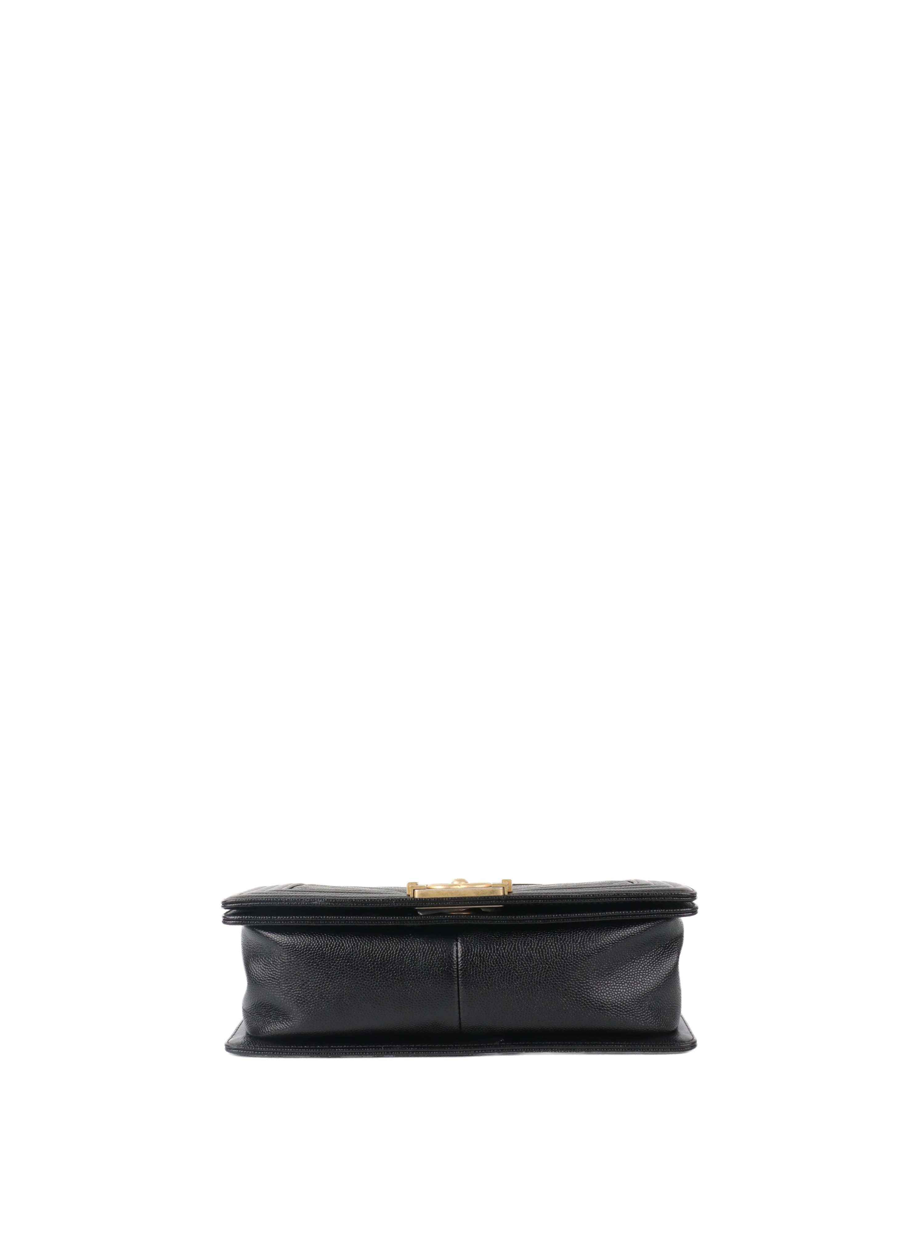 Chanel Black Chevron Caviar Medium Boy Bag.